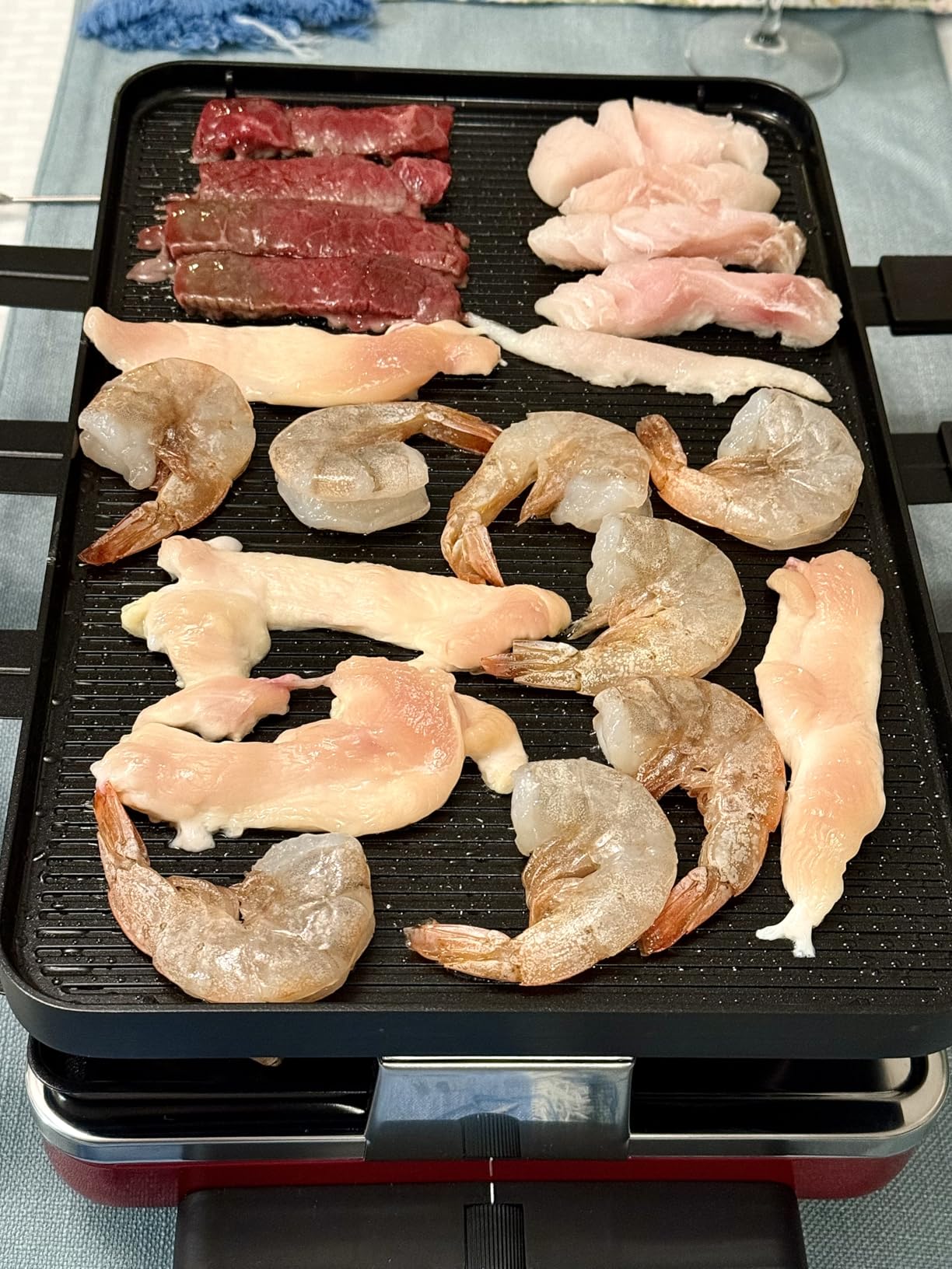 Swissmar Classic 8-Person Raclette Party Grill with Reversible Cast Aluminum Non-Stick Grill Plate/Crepe Top, Indoor Electric Raclette Grill & Griller - Black Grill Plate - Red customer photo 2