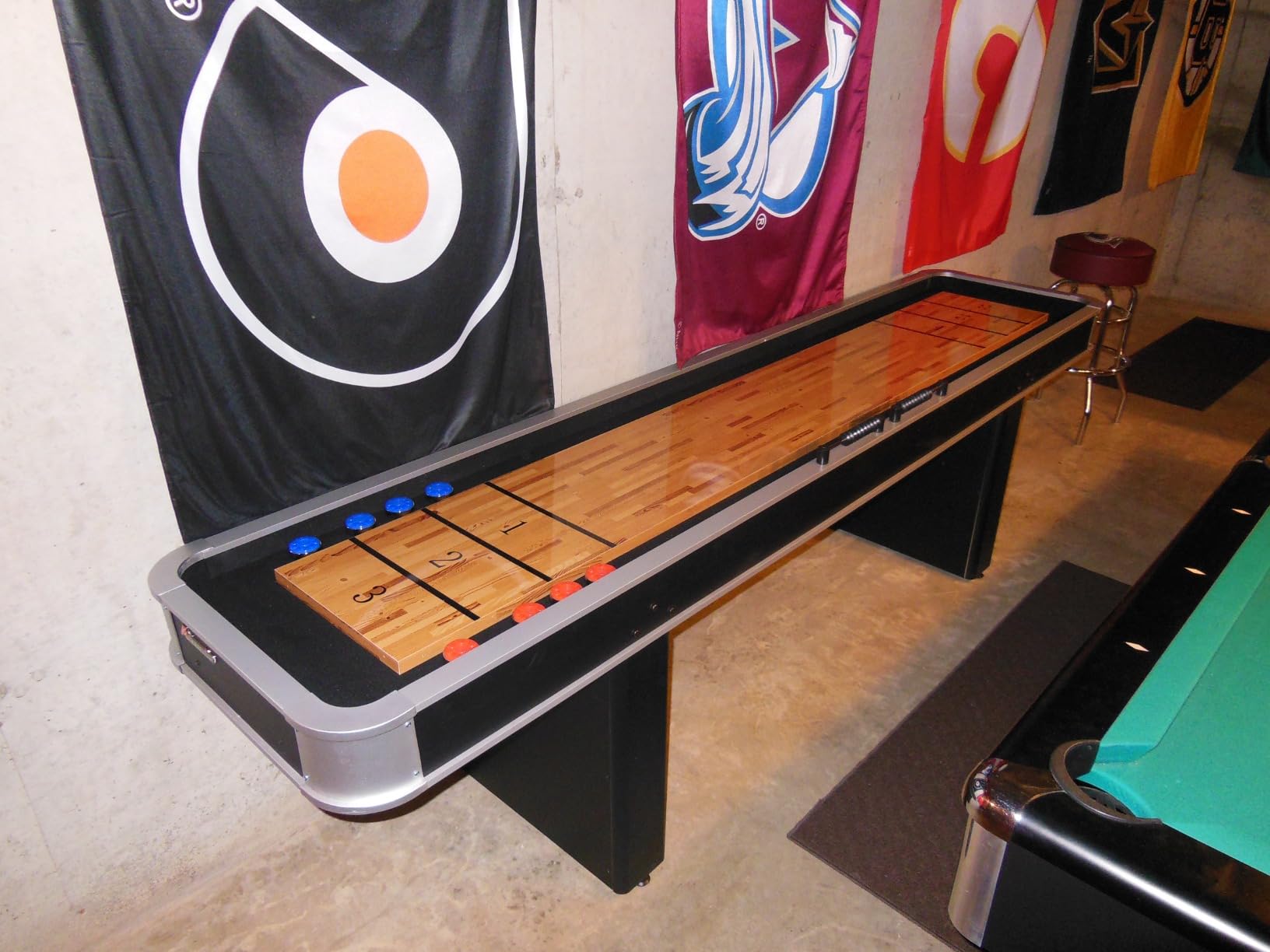 Atomic 9' LED Shuffleboard Tables with Poly-Coated Playing Surface for Smooth, Fast Puck Action and Pedestal Legs with Levelers for Optimum Stability and Level Play customer photo 1