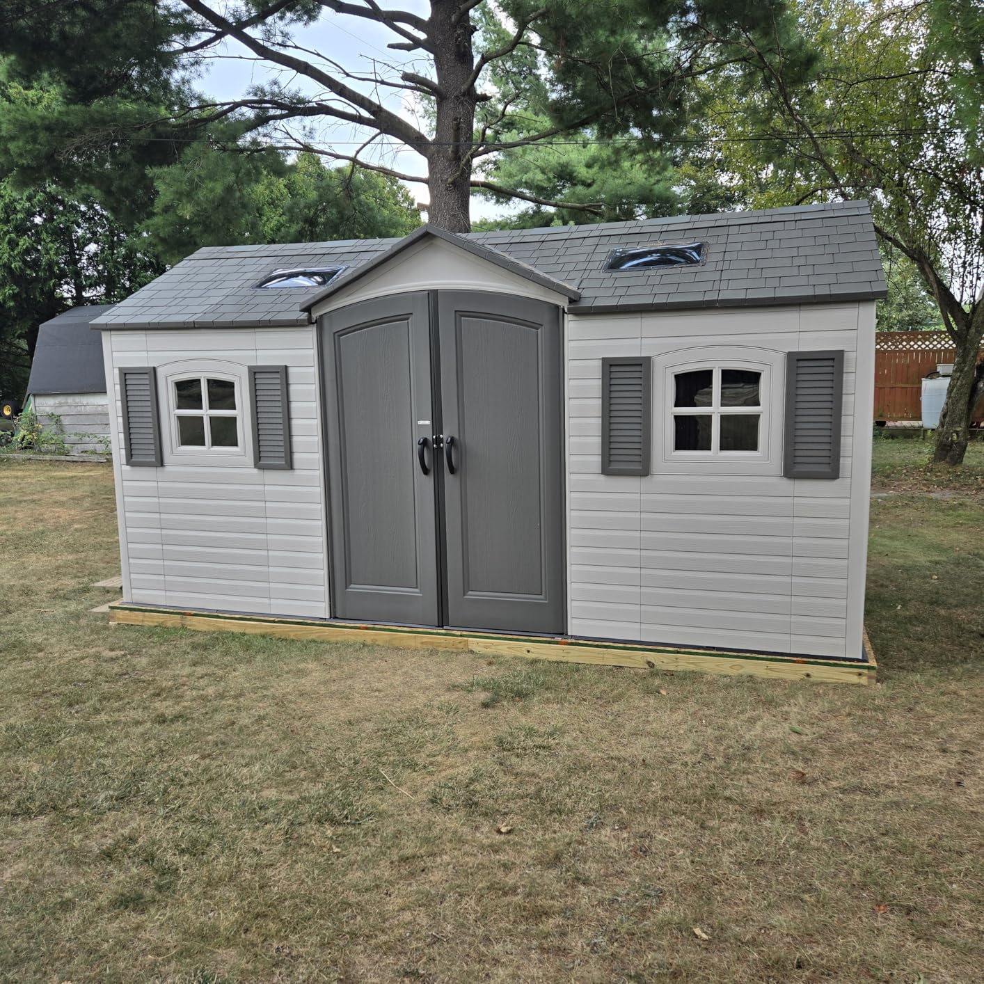 Lifetime 15×8 Ft Dual‑Entry Outdoor Storage Shed, Steel‑Reinforced, UV‑Protected, Weather‑Resistant Backyard Garden Shed with Skylights, Windows & Shelving, Desert Sand customer photo 1