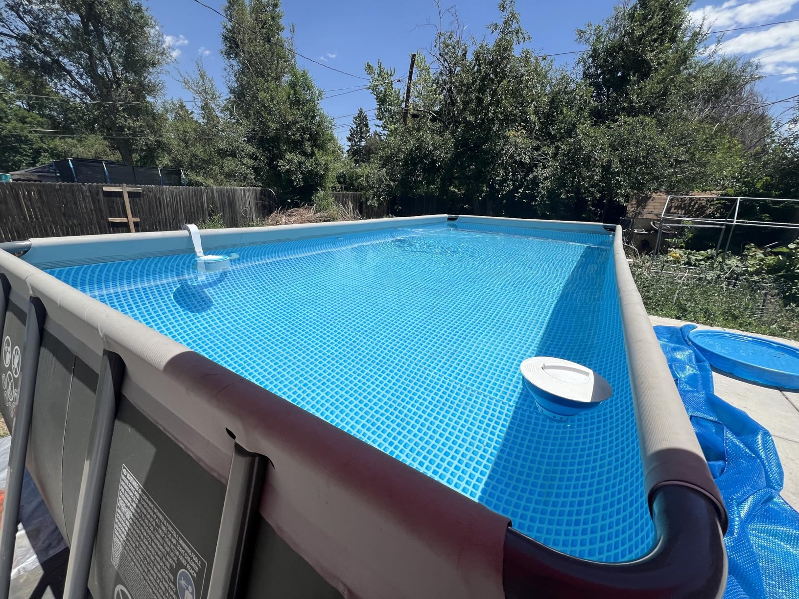 INTEX Ultra XTR 18 ft x 9 ft 52 in Above Ground Pool Set, Rectangular Swimming Pool with Steel Frame, 1500 GPH Sand Filter Pump, Ladder, Cover, & Ground Cloth customer photo 2
