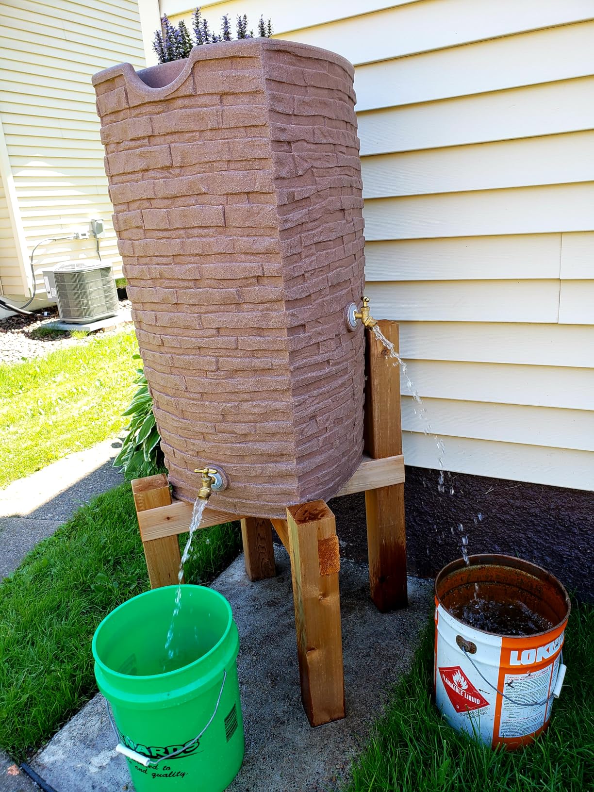 Good Ideas Impressions Riverwalk Rain Water Collection Barrel, Dark Granite, 50 Gallon - Faux Slate Rock Rainwater Catcher, Plastic Storage Drum with Dual Robust Metal Spigots & Fine Mesh Screen customer photo 2