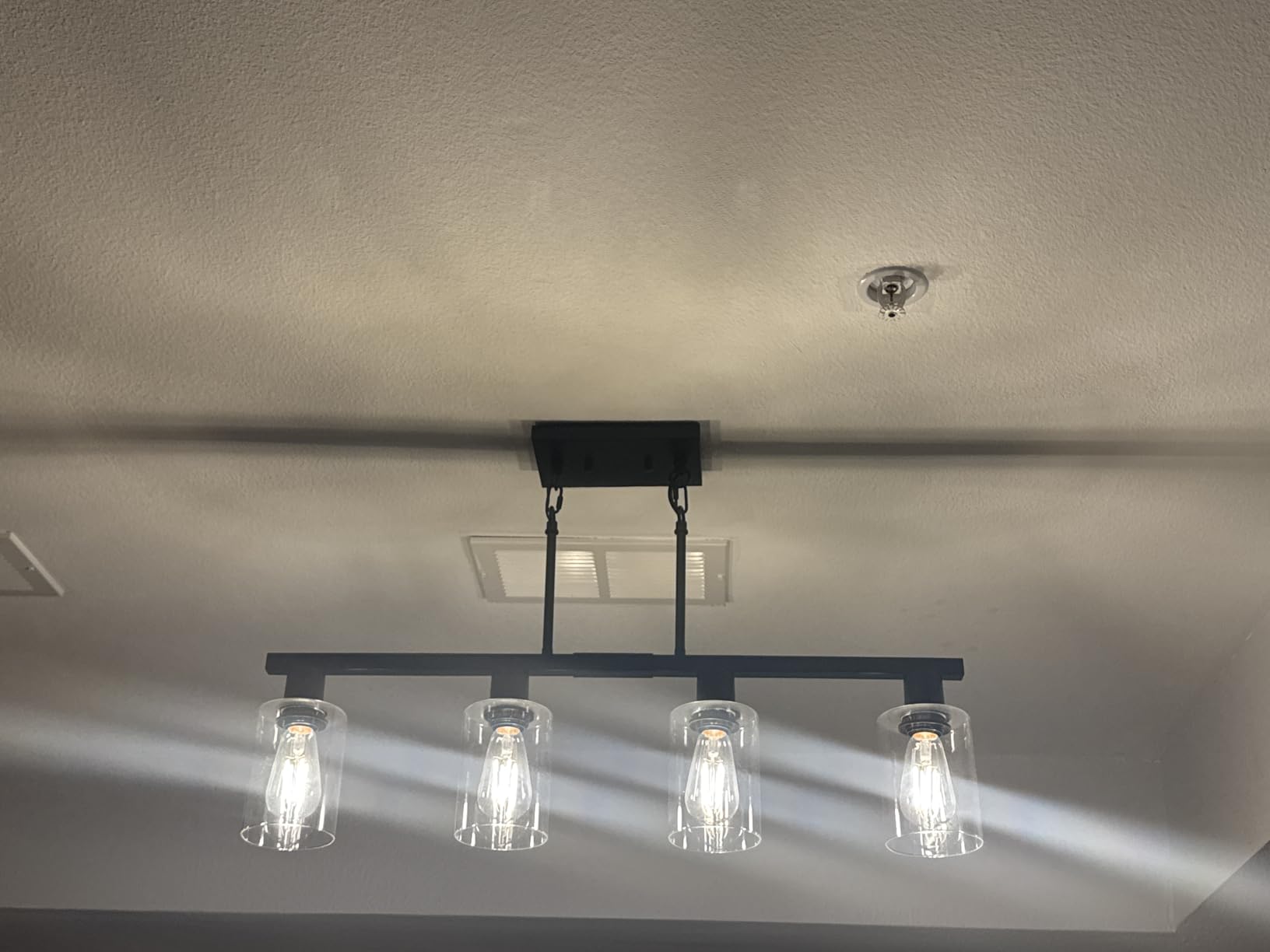 4-Light Kitchen Island Lighting, Black Simplicity Bar Island Lights for Kitchen, Farmhouse Chandelier with Adjustable Height & Clear Glass Shades, Linear Hanging Dining Room Light Fixture Over Table customer photo 2