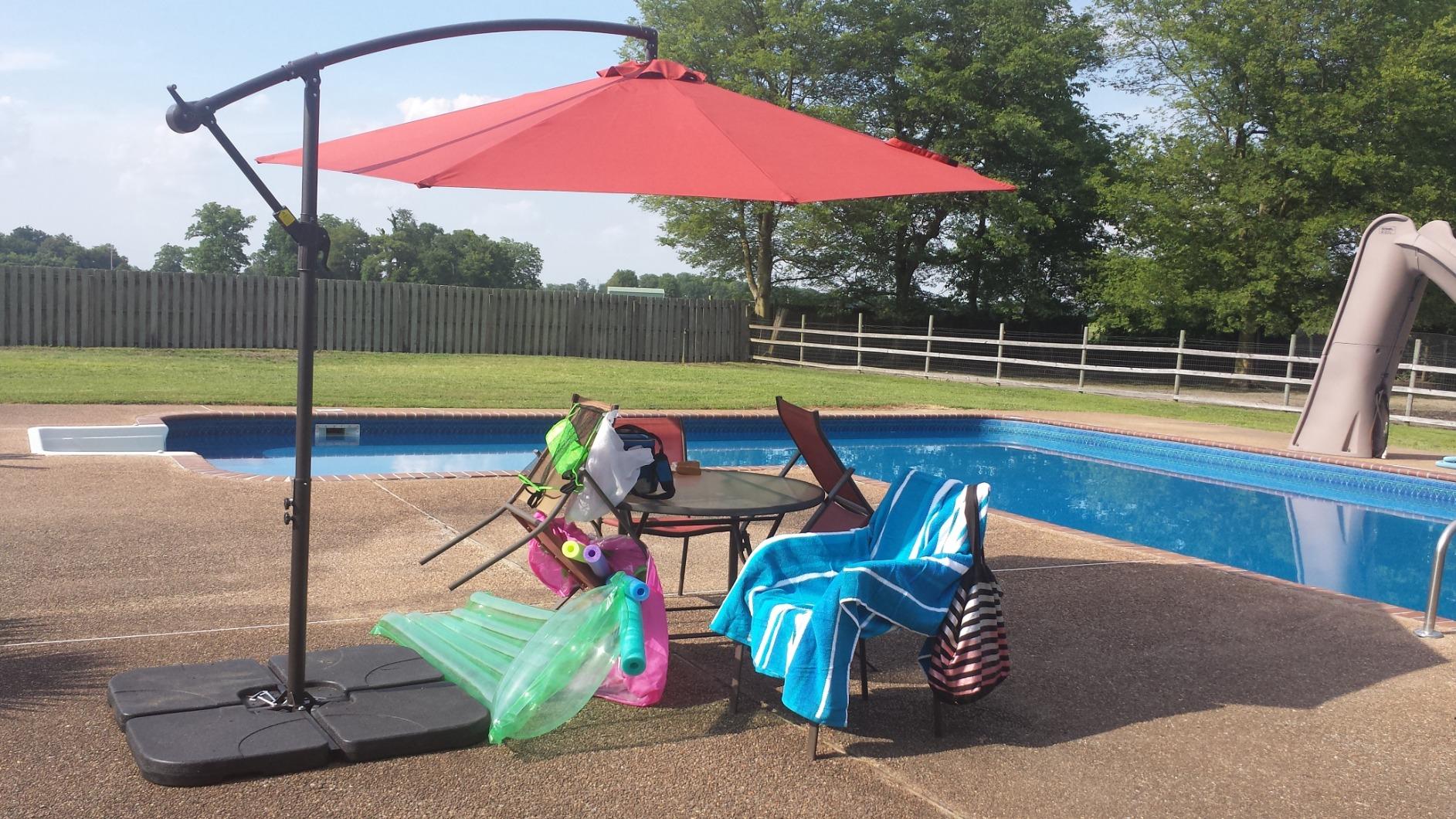 wikiwiki 10ft Solar LED Patio Umbrella with Base Included, Offset Umbrella with Weighted Sandbag Base customer photo 2