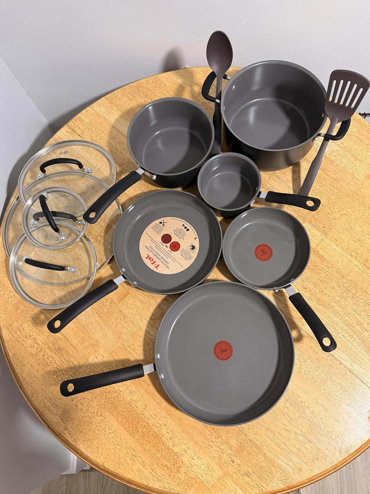 T-Fal Ultimate Hard Anodized 12-Piece Ceramic Nonstick Cookware Set, Oven Safe Up to 400°F, Ceramic Pots and Pans Set, Frying Pans, Saucepan, Stockpot, Cooking Utensils, Grey customer photo 1