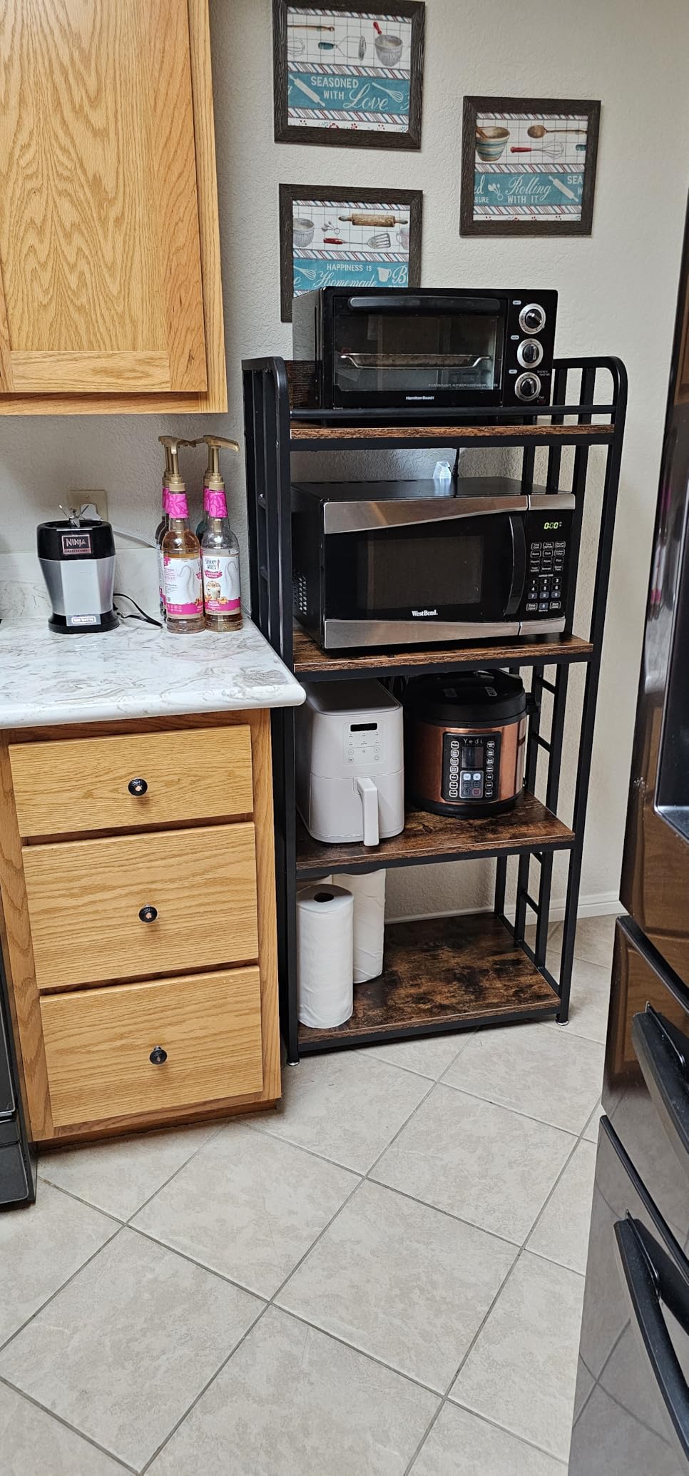 Adjustable 4-Tier Heavy Duty Kitchen Baker's Rack with Power Outlet, with Industrial Wheels, Free Standing Microwave Oven Cart Stand for Storage in Living Room, Garage, Rustic Brown customer photo 1