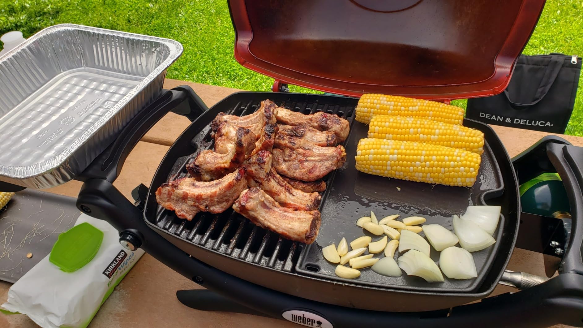 Weber Q1200 Liquid Propane Portable Gas Grill, Green - 1-Burner Travel and Camping Grill with Cast-Iron Grates & Electronic Ignition (8,500 BTU Burner) customer photo 2