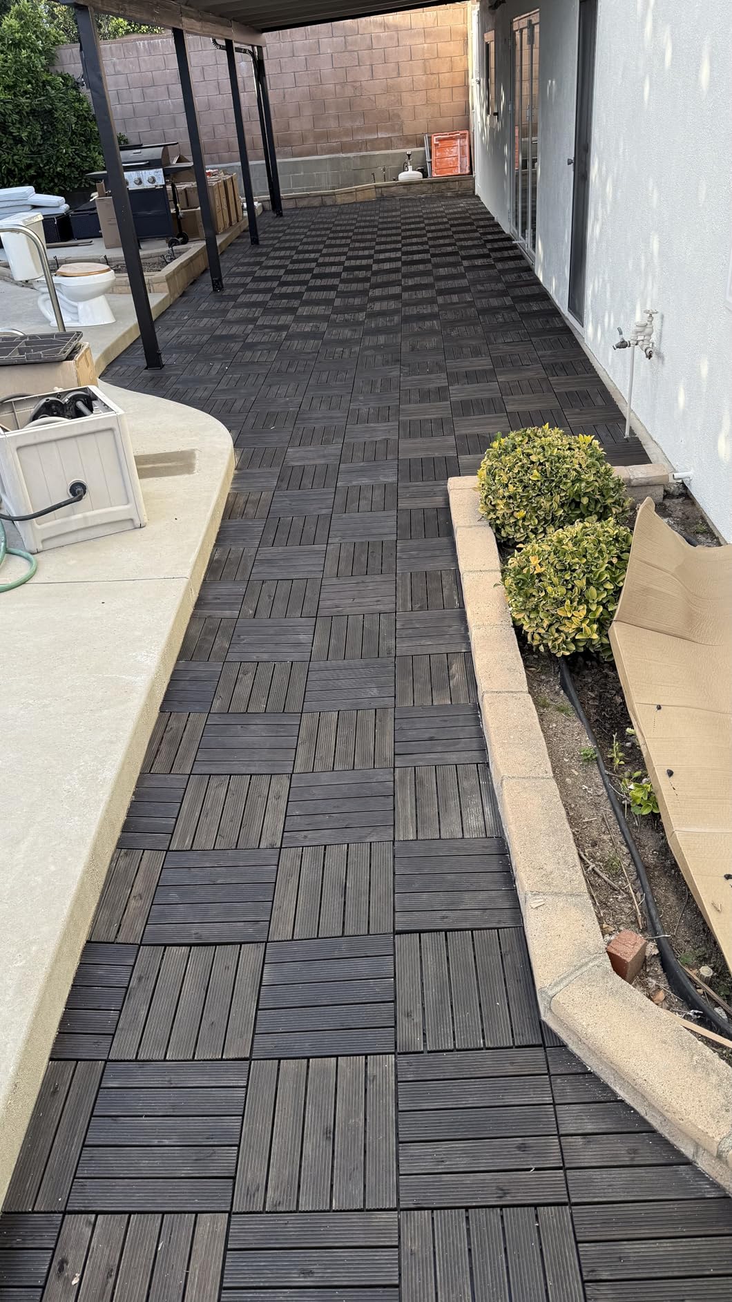 Yaheetech 27PCS Interlocking Wooden Flooring Patio Deck Tiles Solid Wood Tiles Outdoor 12 x 12in Black customer photo 1