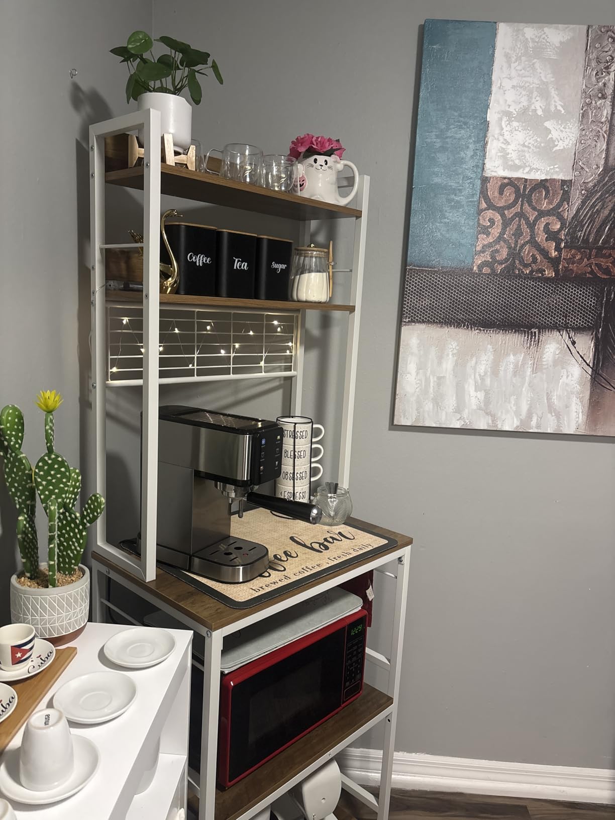 VASAGLE Bakers Rack with Power Outlet, Microwave Stand, Kitchen Tall Utility Storage Shelf, with Metal Wire Panel, 14 Hooks, 15.7 x 23.6 x 66.9 Inches, Rustic Brown and Ink Black UKKS037B01 customer photo 1