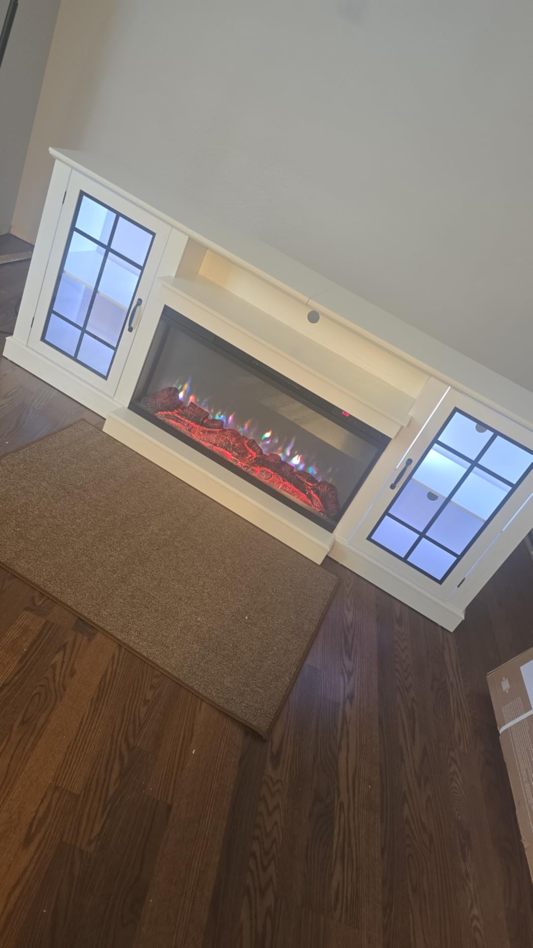 oneinmil 59'' Fireplace TV Stand, 3 Sided Glass Media Entertainment Center Console Table for TVs up to 65'' with Glass Door Closed Storage, Set of TV Table, White customer photo 1
