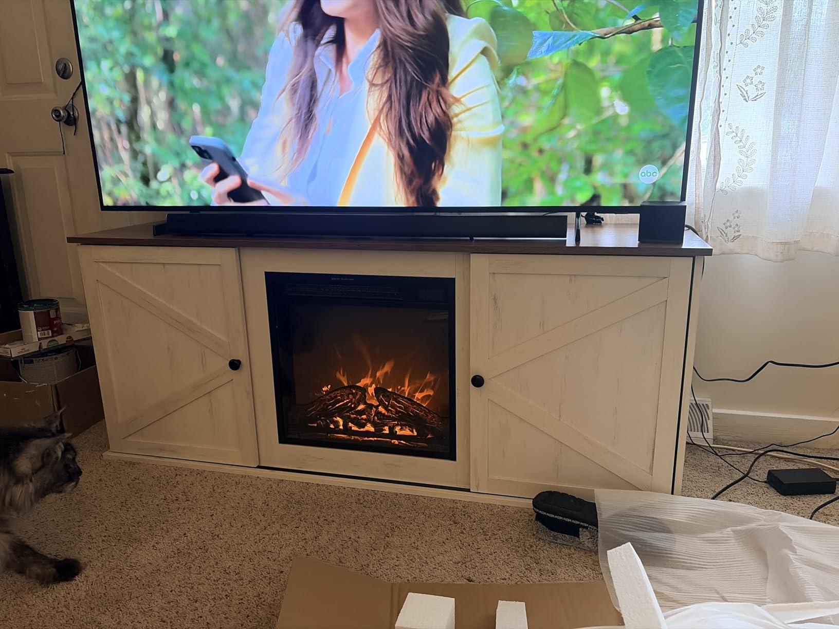 VASAGLE Farmhouse TV Stand for TVs up to 80 Inches, Entertainment Center with Storage Cabinets and Sliding Barn Doors, Media Console Table for Living Room, Rustic White and Honey Brown ULT V537W01 customer photo 1