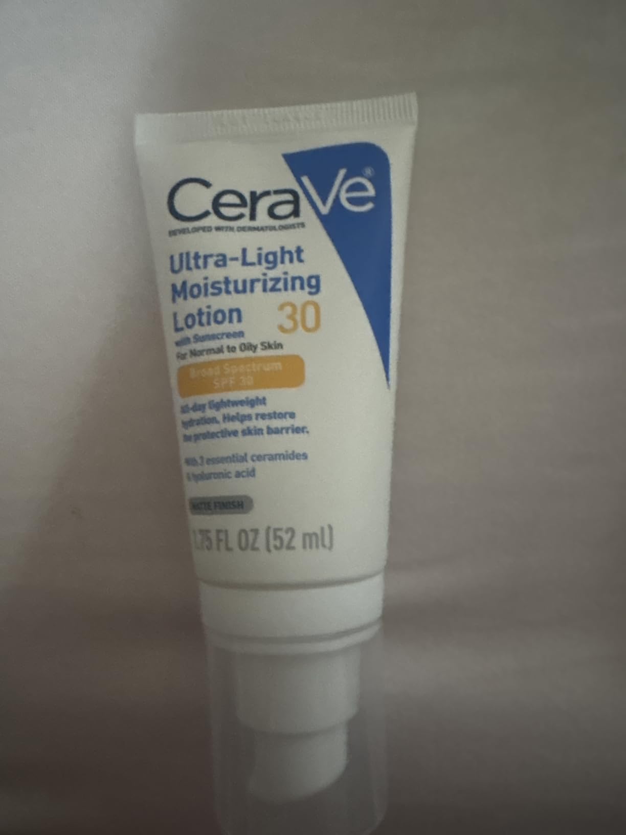 CeraVe Ultra-Light Moisturizing Lotion With SPF 30, Daily Face Moisturizer with SPF, Formulated with Hyaluronic Acid & Ceramides, Broad Spectrum SPF, Oil Free, Matte Finish, 1.7 Ounce customer photo 1