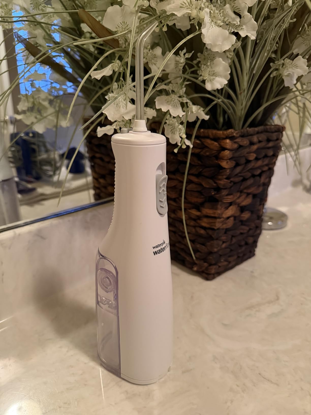 Cordless Express Portable Water Flosser, 3 AA Batteries, White | 2 Settings, 2 Tips, for Daily Gum Health & Cleaning Teeth, Travel, Shower Use, ADA Accepted, WF-02 Packaging May Vary customer photo 1