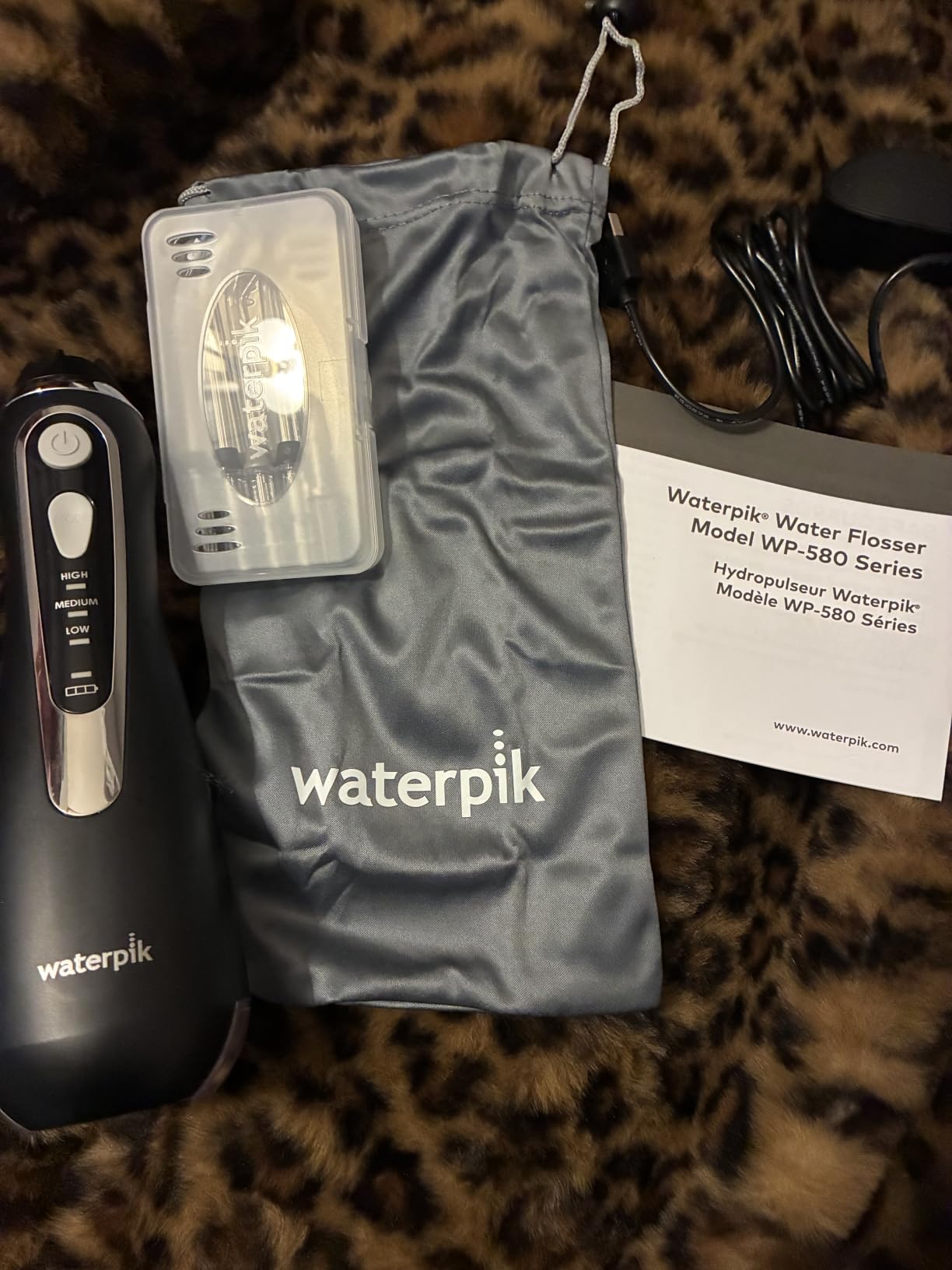 Cordless Advanced Portable Water Flosser, Rechargeable, Gray | 3 Settings, 4 Tips, Travel Bag, for Gums, Teeth, Dental Braces, Implants, Shower Use ADA Accepted WP-587 Packaging May Vary customer photo 2