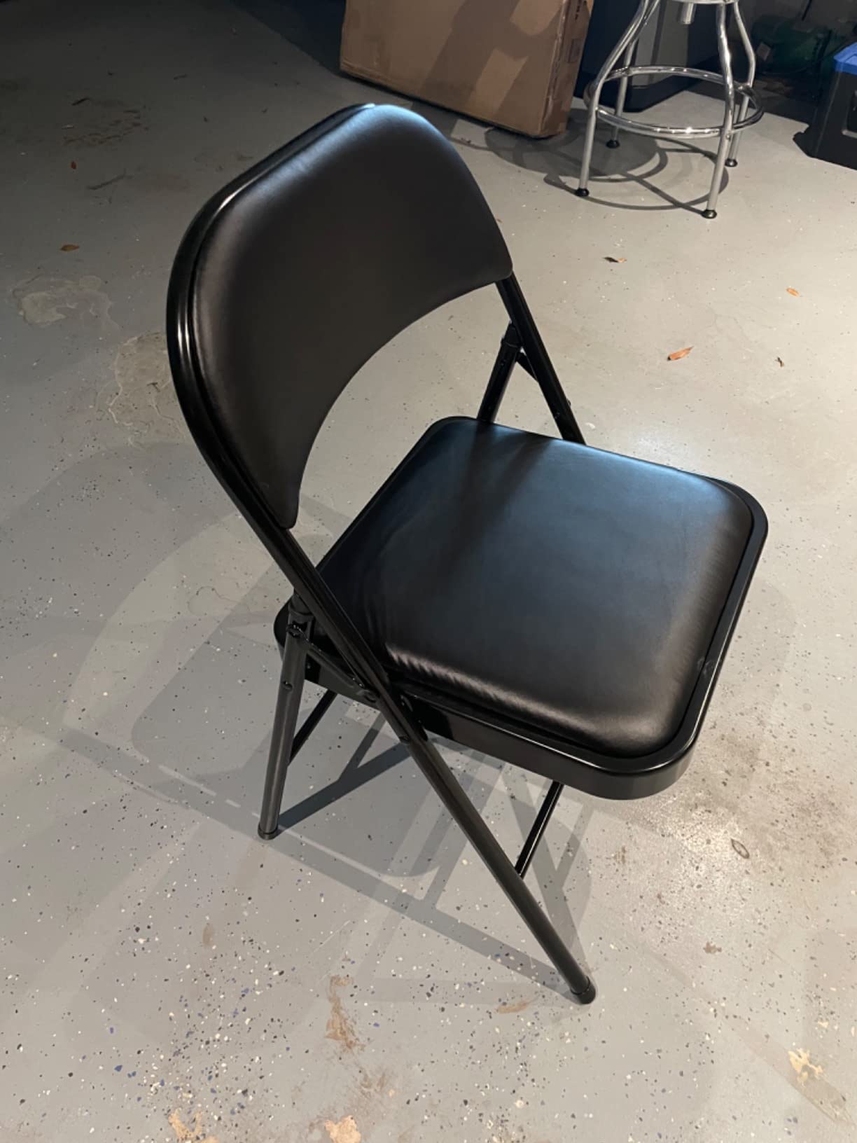 Amazon Basics Comfortable Vinyl-Padded Metal Steel Folding Chairs for Events, Easy to Fold and Store, Black, 4-Pack customer photo 2