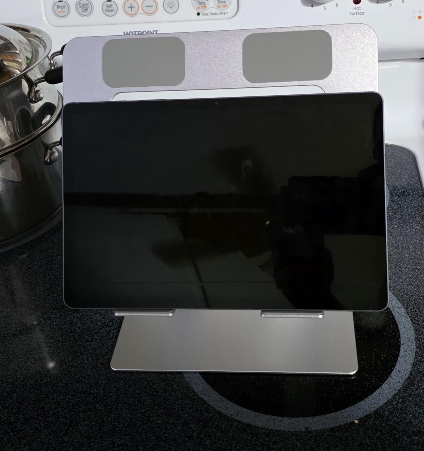 Amazon Basics Sturdy and Portable Ergonomic Laptop Stand for Desk, Height Adjustable Riser with Ventilated Cooling, Foldable, Fits all Laptops up to 15.6 Inch, Silver customer photo 1