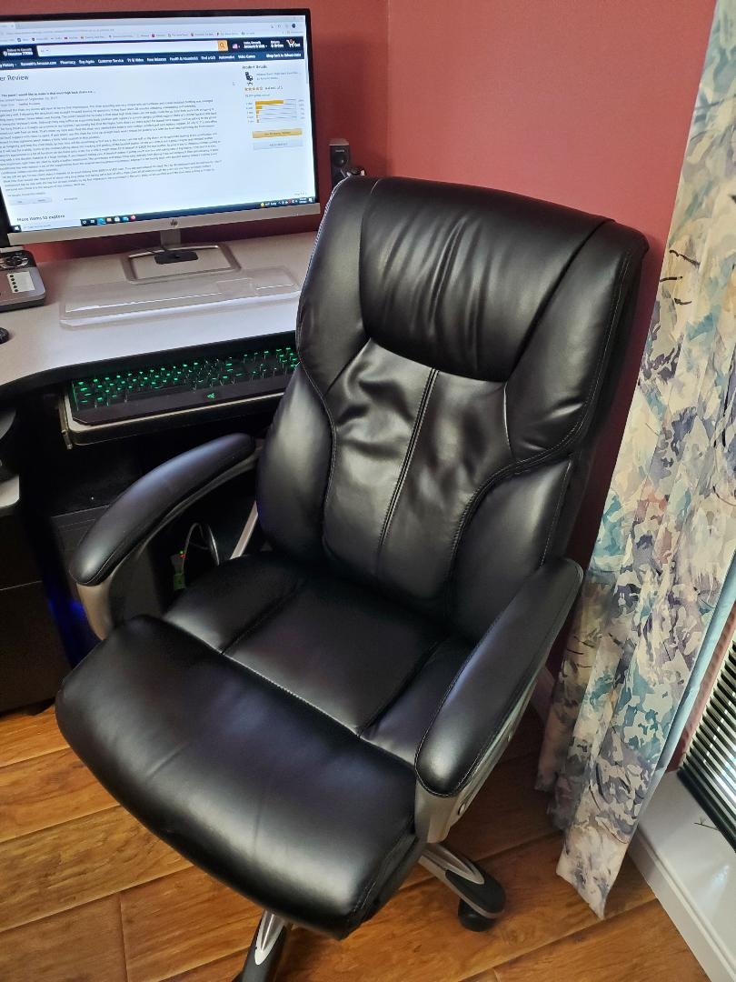 Amazon Basics Executive High Back Office Chair, Adjustable Height, Tilt, Swivel, Padded Seat, Bonded Leather, Wheels, Black/Silver customer photo 2