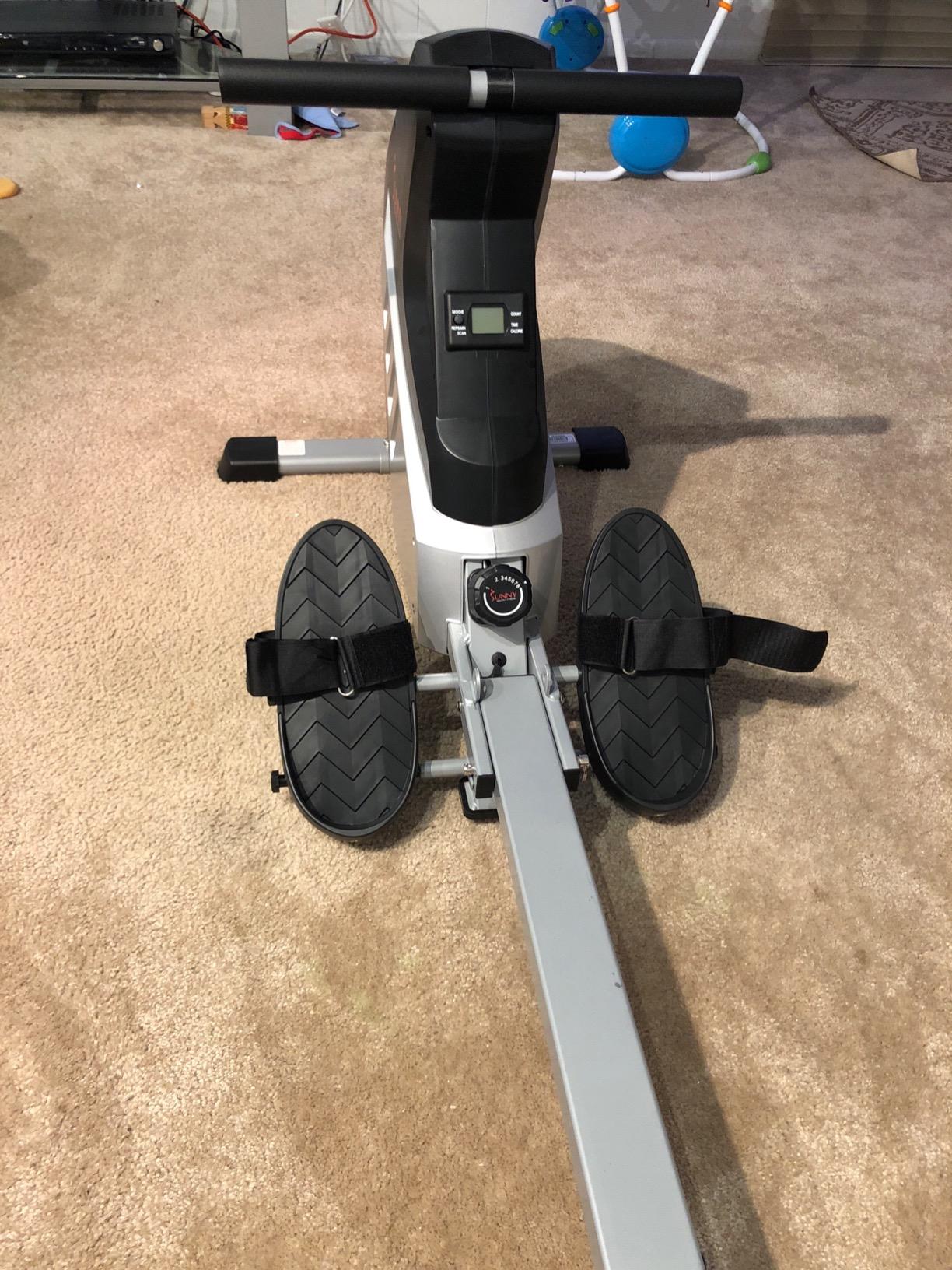 Sunny Health & Fitness Air Rowing Machine, Space-Saving Rower with Long Rail and Upright Storage for Home Gym, Full-Body Cardio Workout, Free SunnyFit Training App customer photo 1