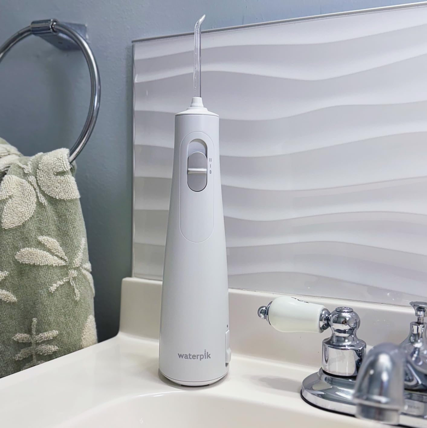 Cordless 1100 Rechargeable Portable Water Flosser for Teeth Cleaning and Flossing, Travel, Braces Care, Healthier Gums, Waterproof for Shower, ADA Accepted, WF-30CD White, Packaging May Vary customer photo 1