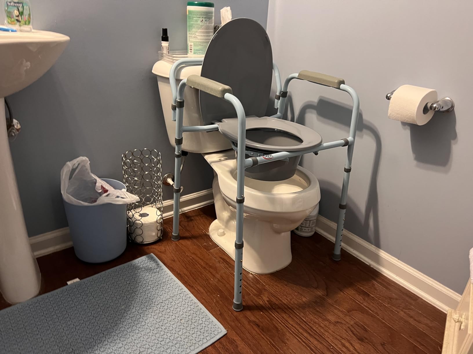 Carex 3-in-1 Folding Bedside Commode and Raised Toilet Seat, Portable Toilet Supports Up to 300lbs customer photo 2