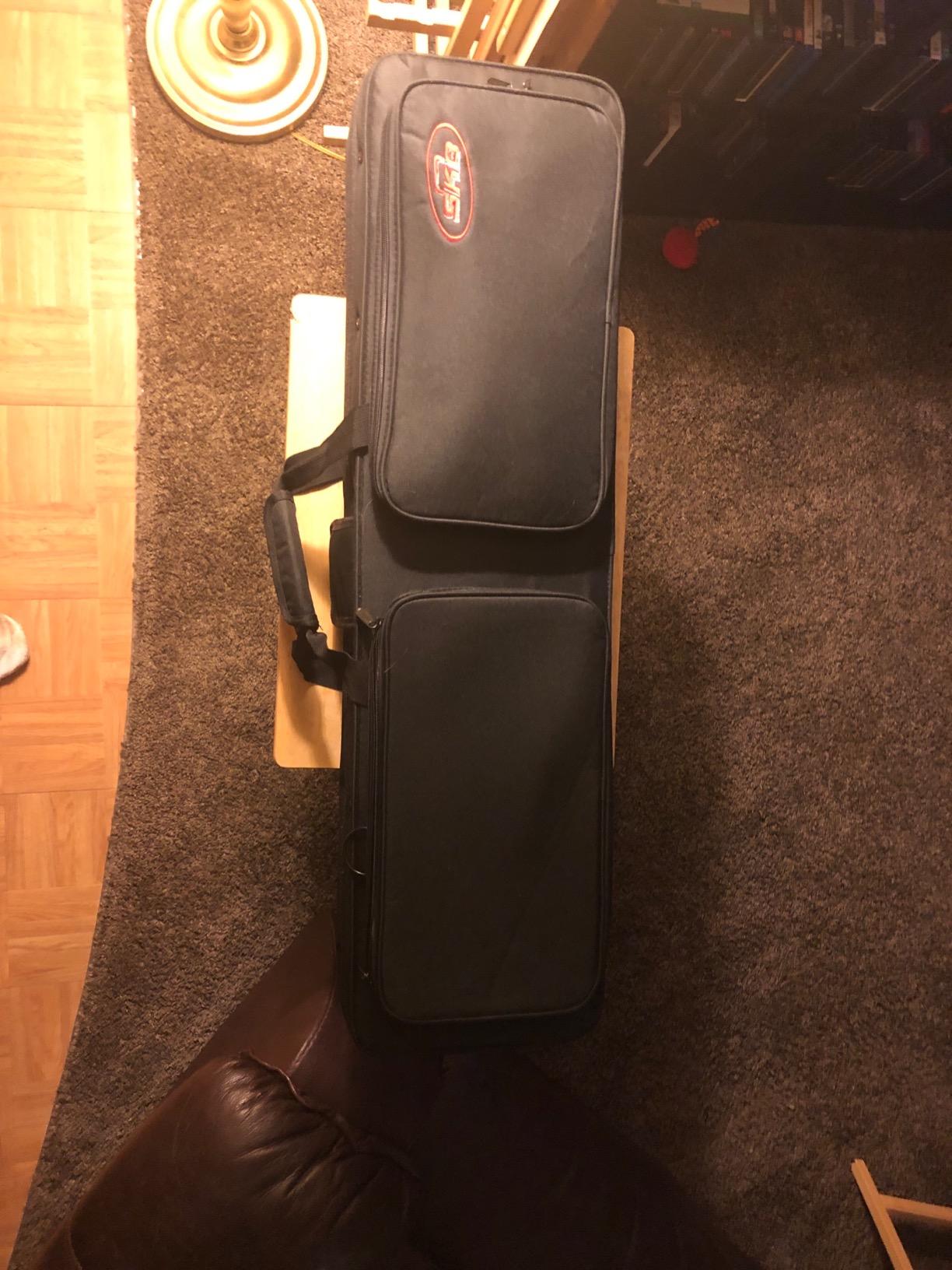 SKB Cases Rugged Exterior and Rigid Foam Interior Hybrid Breakdown Travel Shotgun Case for 33.75 Inch Barrels with 2 External Pouches, Black customer photo 2