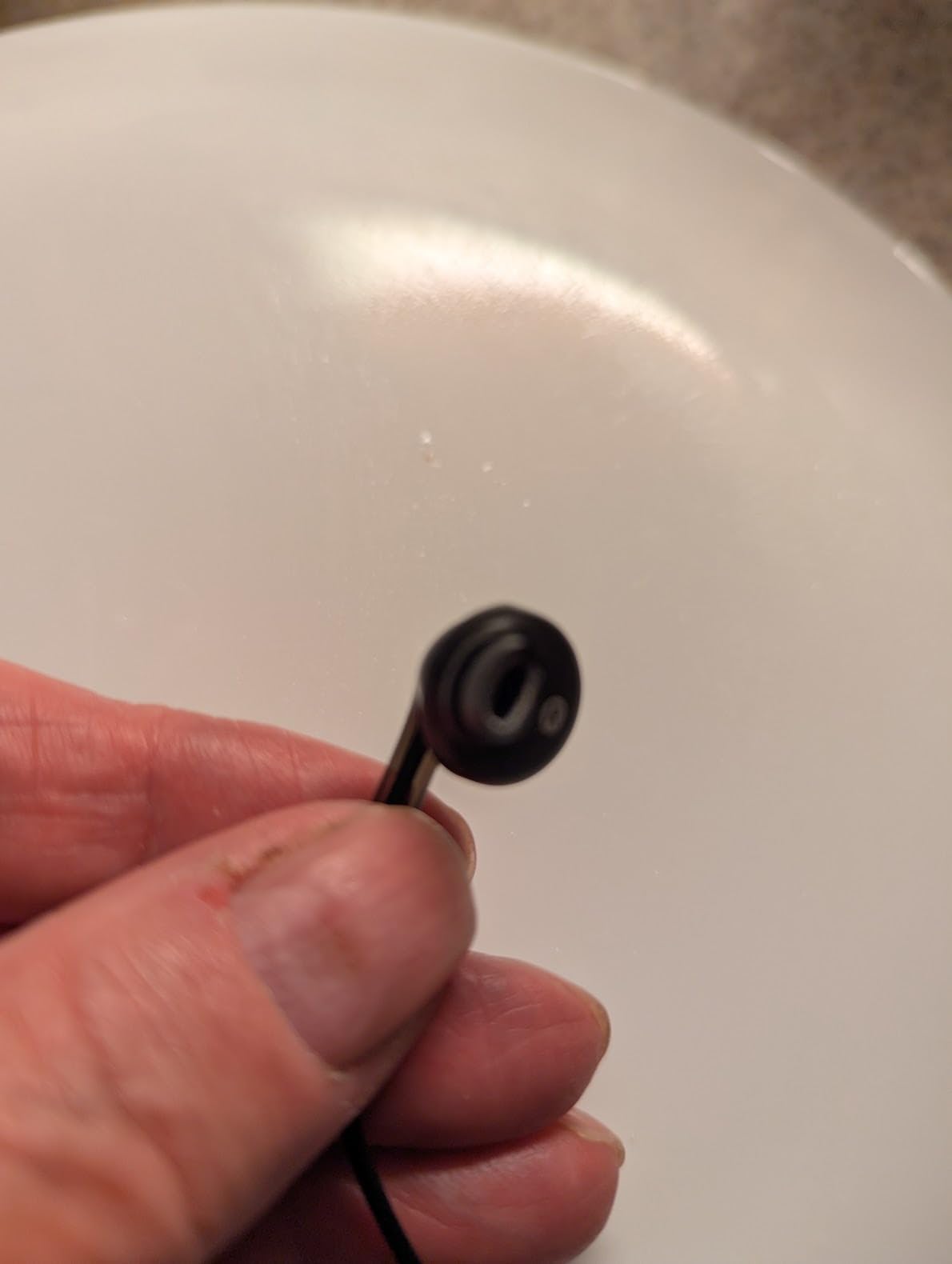 Amazon Basics Wired Earbuds with Microphone, In-Ear Headphones, 3.5mm Jack, High Definition Sound, Secure Fit, 4.2 ft Cable, S/M/L Ear Tips, Black customer photo 1