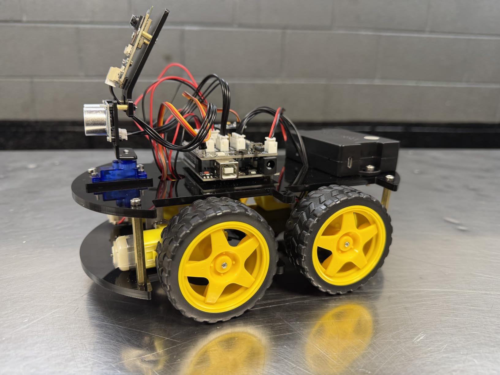 ELEGOO UNO R3 Smart Robot Car Kit V4 with Camera, Compatible with Arduino | FPV Video, Line Tracking, Obstacle Avoidance, Auto Follow, App & IR Control, Class STEM Building & Coding Kit, Gift for 12+ customer photo 1