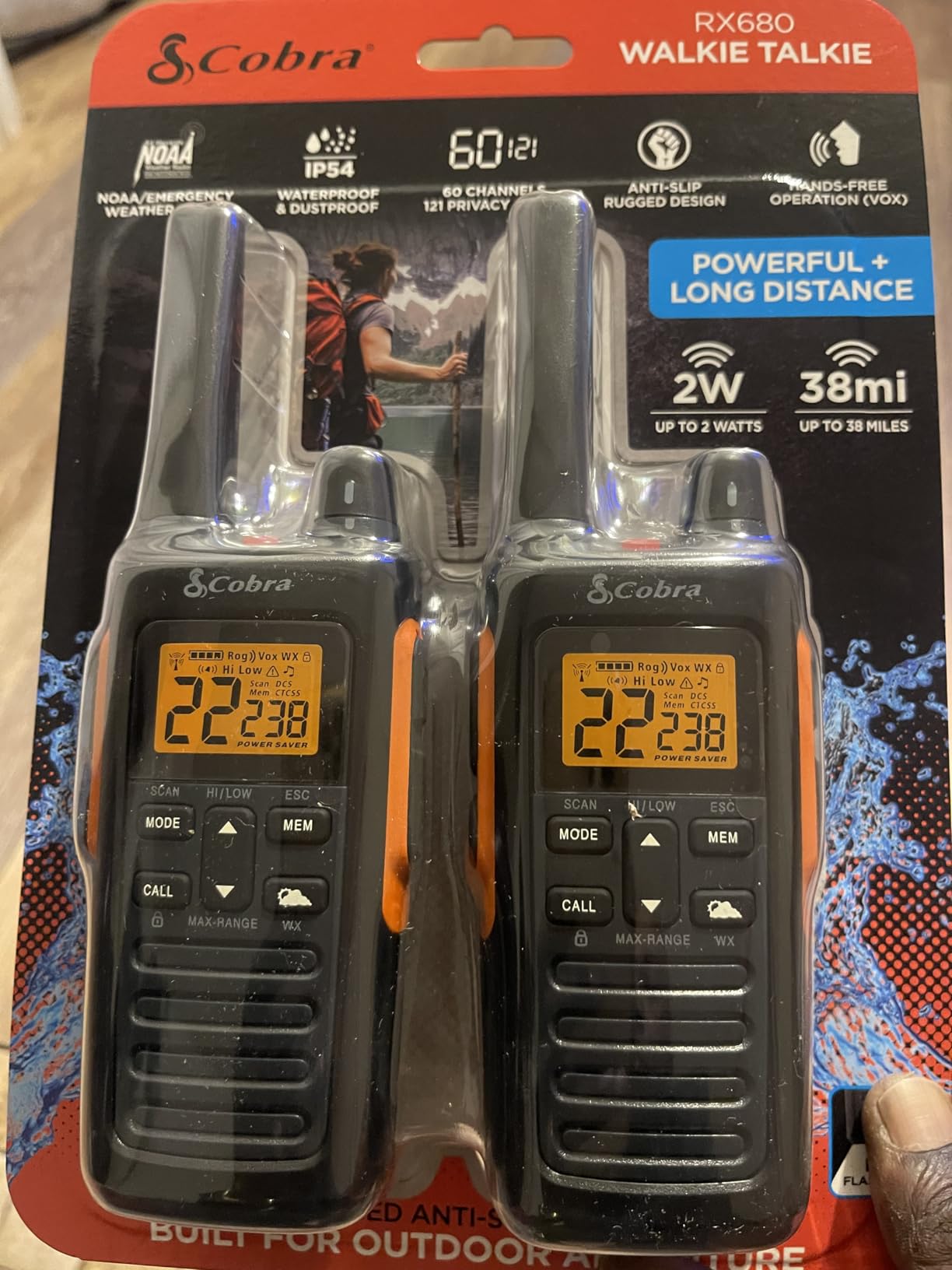 Cobra RX680 Walkie Talkies (2-Pack) - Rugged & Splashproof Two Way Radios Long Range, IP54 Water Resistant Design, 60 Pre-Programmed Channels, Weather Alerts, Included Charging Dock (Black/Orange) customer photo 2