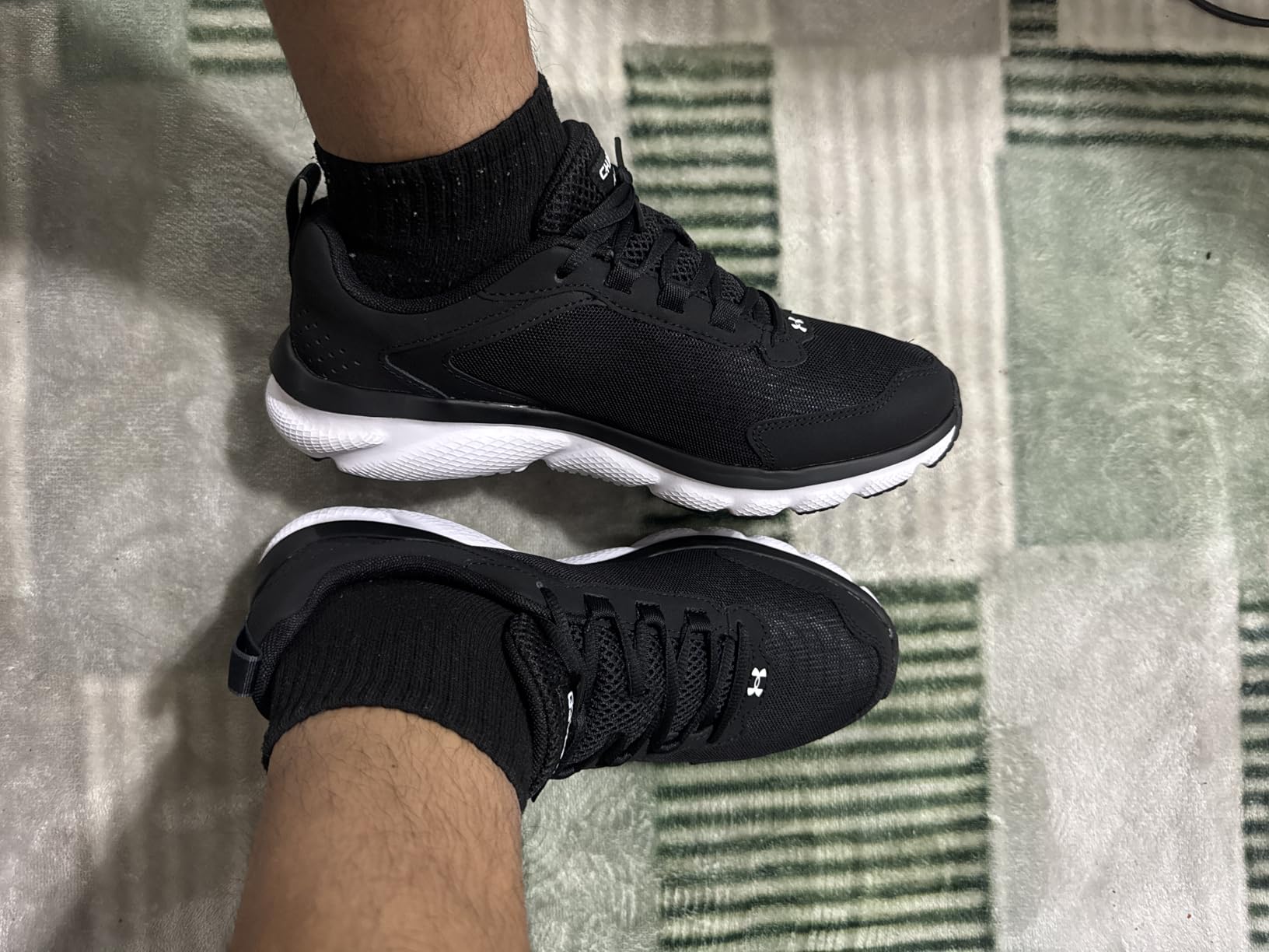 Under Armour Men's Charged Assert 9 Running Shoe customer photo 1