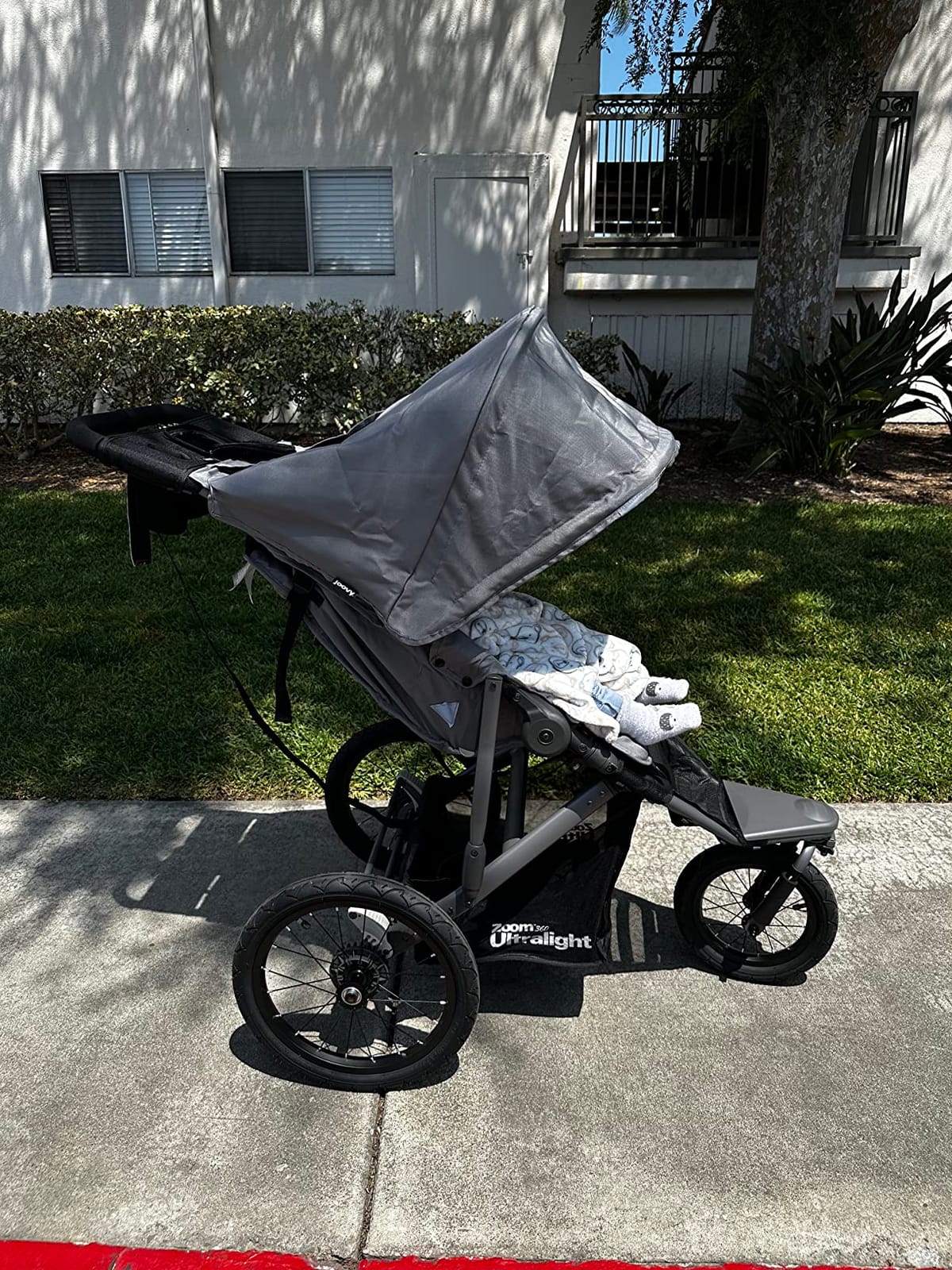 Joovy Zoom360 Ultralight Jogging Stroller, Black | High Child Seat, Shock-Absorbing Suspension, Extra-Large Air-Filled Tires, Parent Organizer, Air Pump, Easy One-Hand Fold customer photo 2