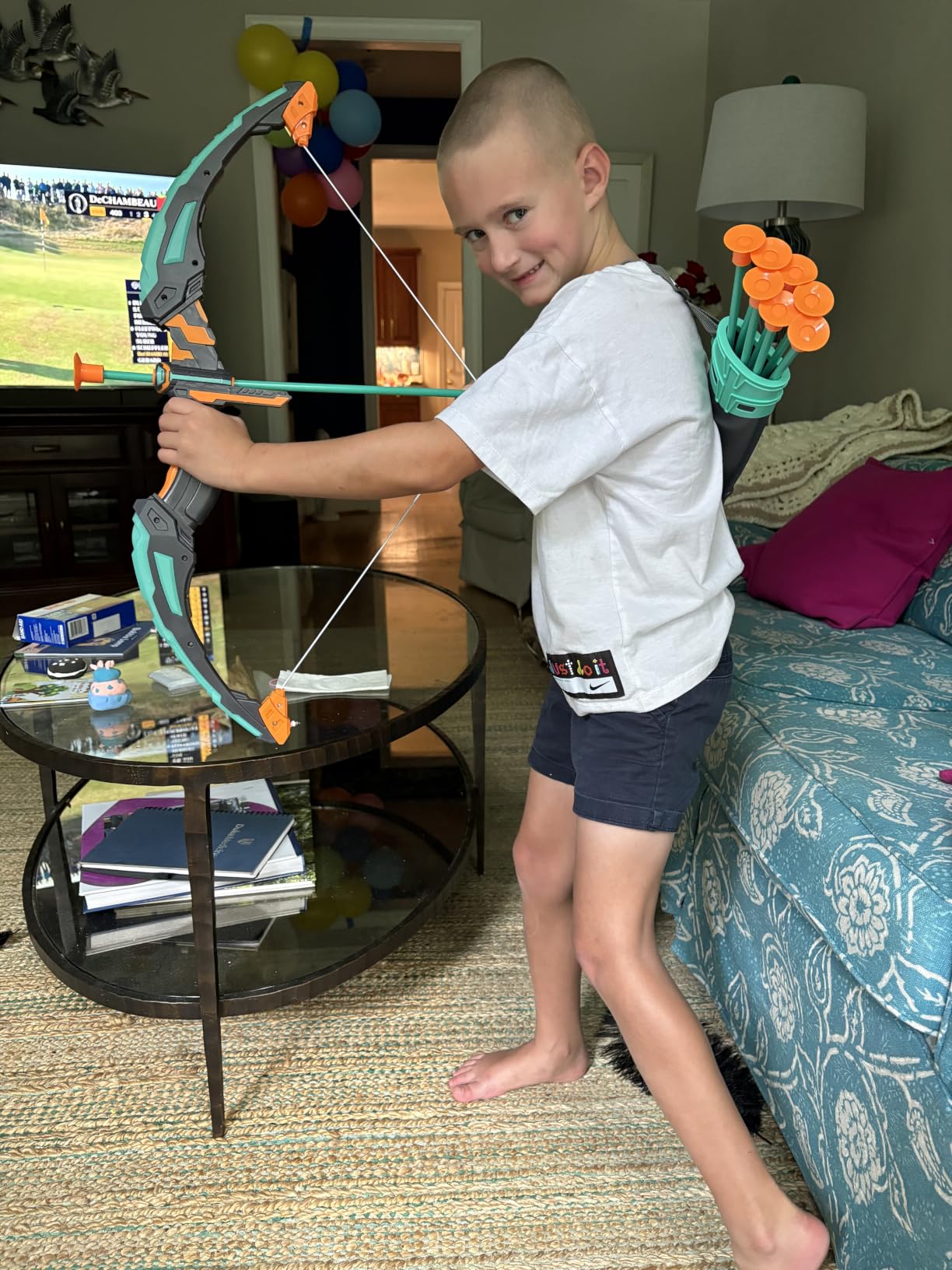 JOYIN Kids Bow and Arrow Set, LED Light Up Archery Toy Set with 9 Suction Cup Arrows, Target & Arrow Case, Indoor and Outdoor Hunting Play Gift Toys for Kids, Boys & Girls Ages 6-12 customer photo 2