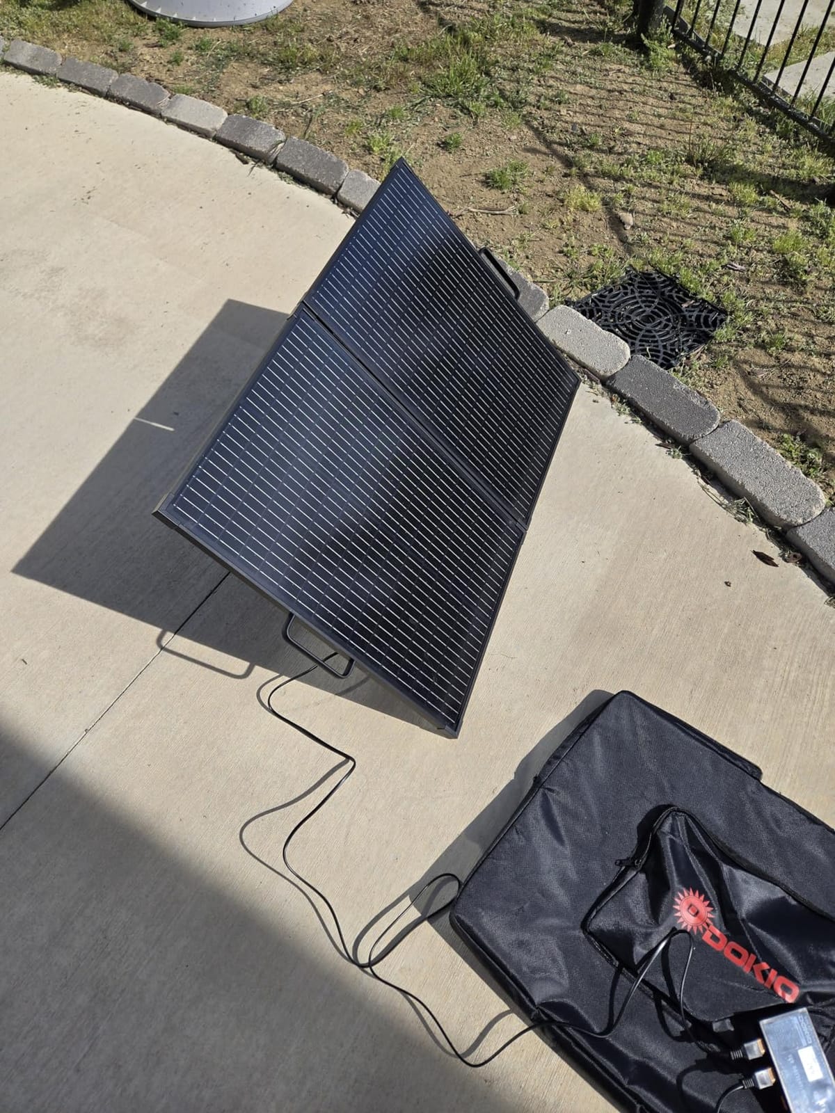 DOKIO 200W Foldable Solar Panel Suitcase with Charge Controller, Gray | Folds to 30 x 26 in and weighs 26 lb; for 12V batteries, power stations, RVs, boats, camping, and emergencies customer photo 1
