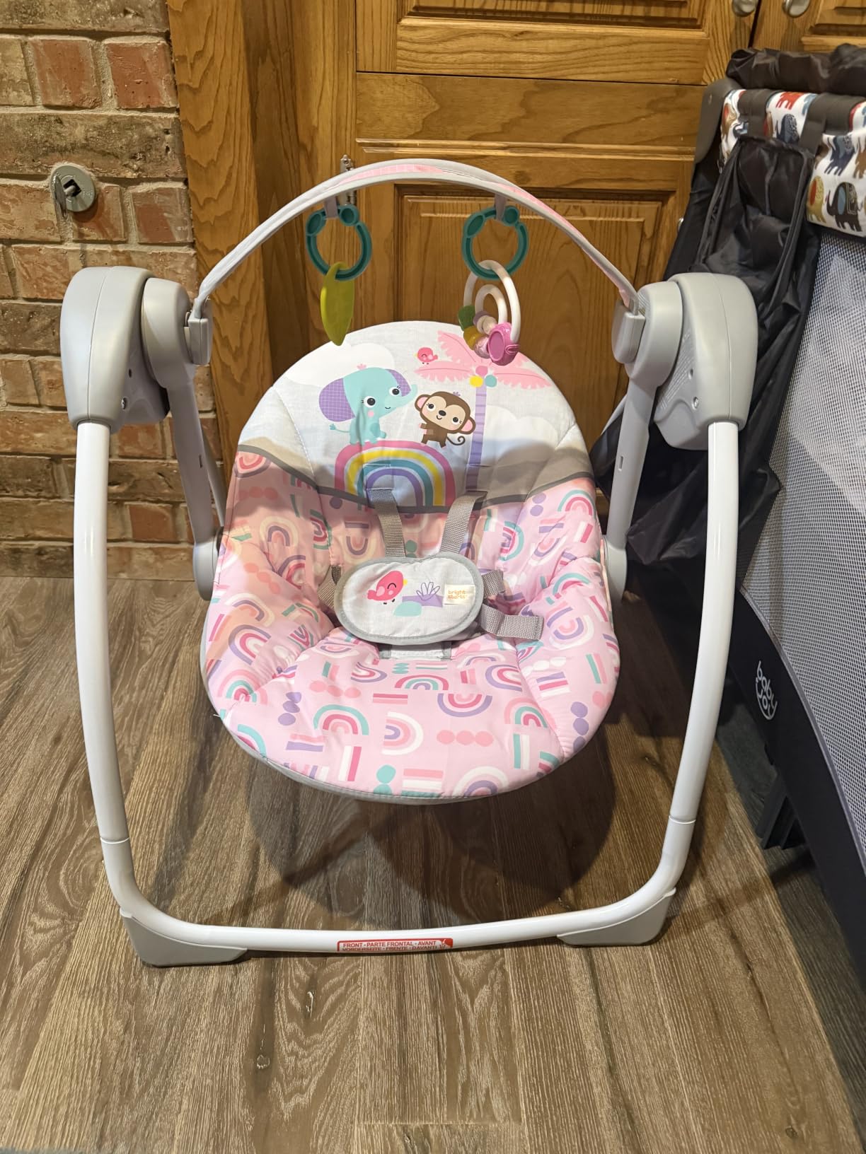 Bright Starts Portable Electric Baby Swing, Newborn to 9 Months | Lightweight & Foldable Swing with 6 Speeds, 10 Soothing Melodies, 2 Hanging Toys, 2-Position Recline, Max Weight 20 lbs customer photo 1