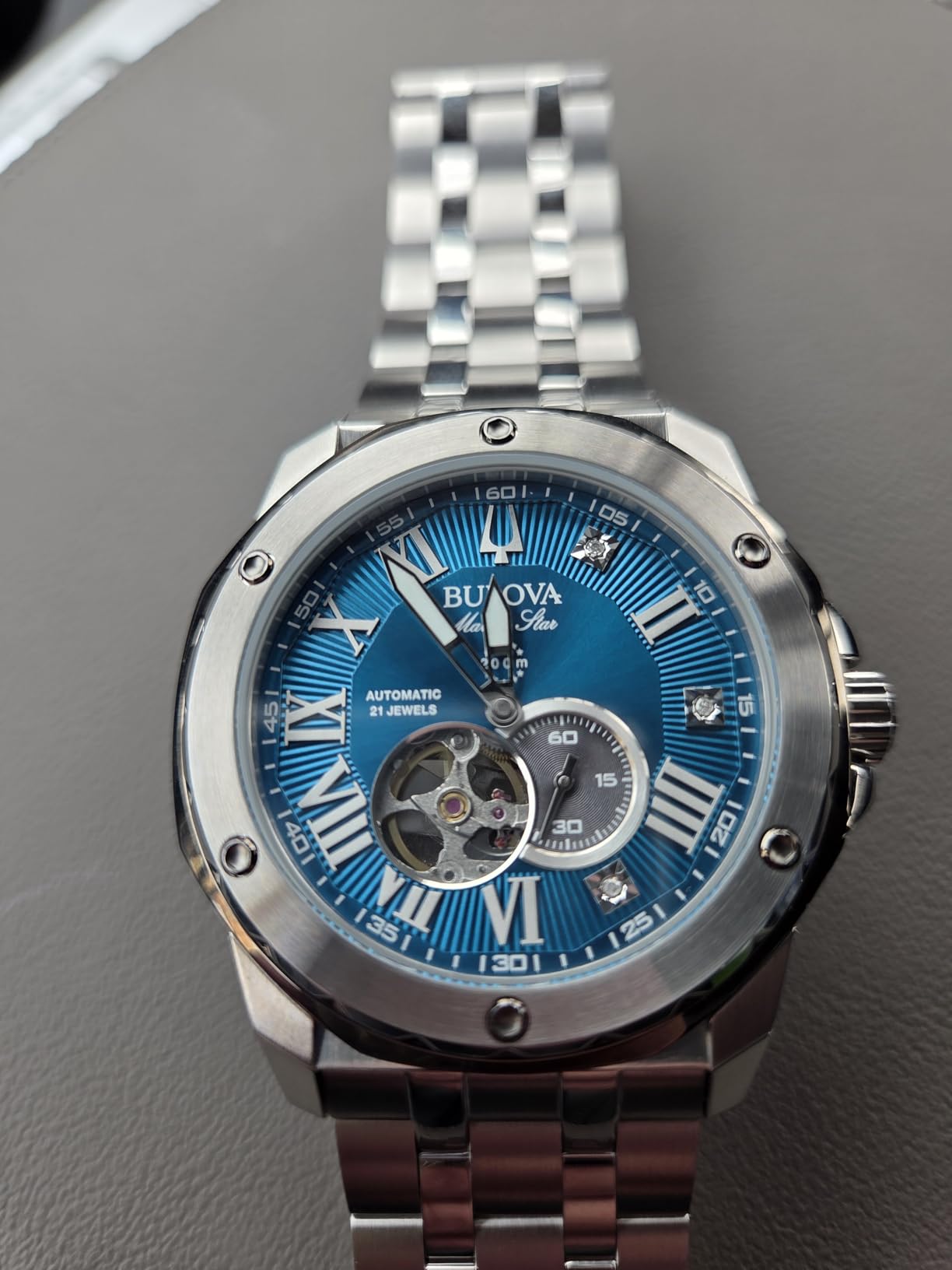 Marc Anthony Men's Automatic Marine Star Stainless Steel Watch, Open Aperture, Exhibition Case Back, Diamond Accent Blue Sunray Dial (Model: 98D184) customer photo 1