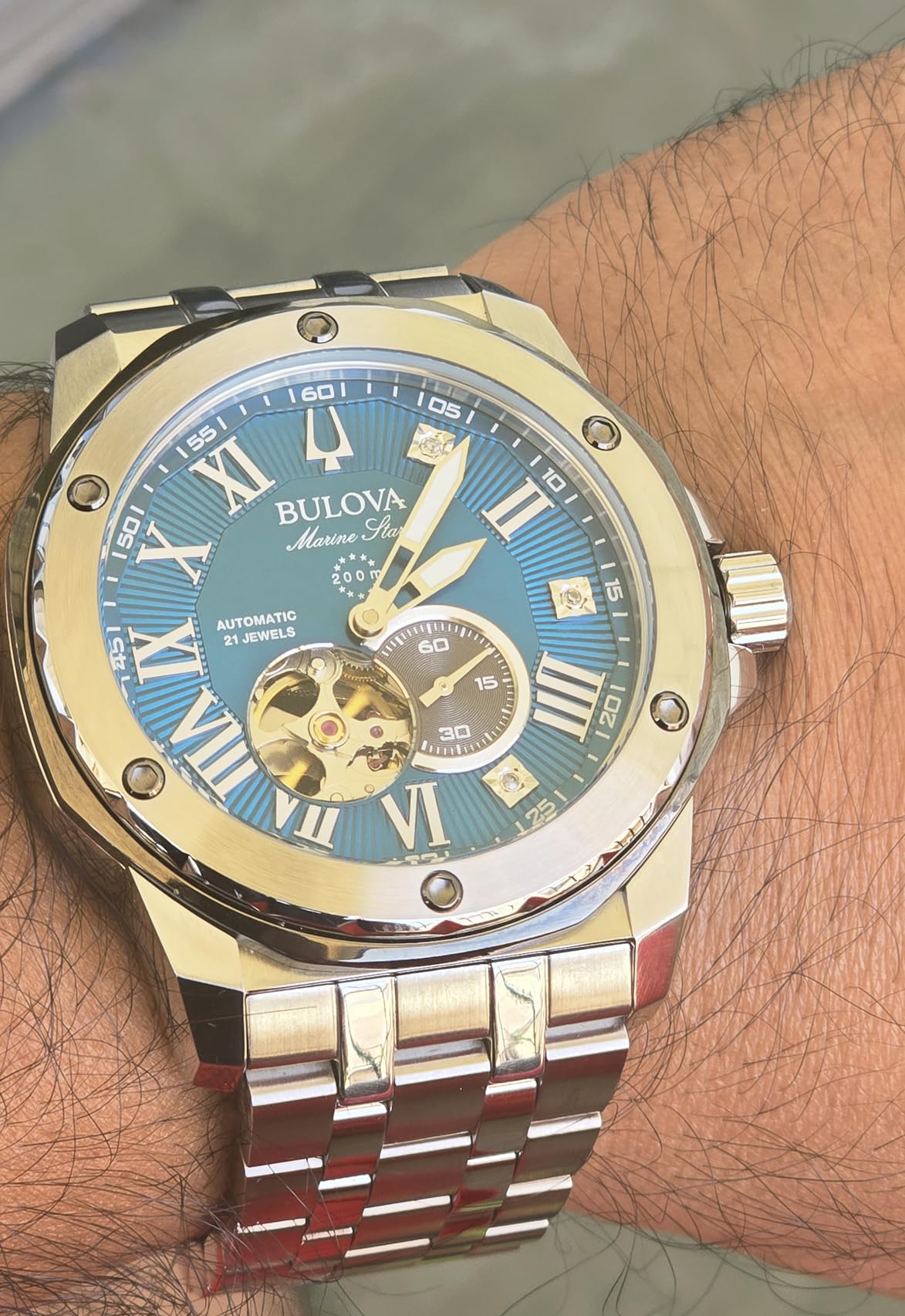 Marc Anthony Men's Automatic Marine Star Stainless Steel Watch, Open Aperture, Exhibition Case Back, Diamond Accent Blue Sunray Dial (Model: 98D184) customer photo 2