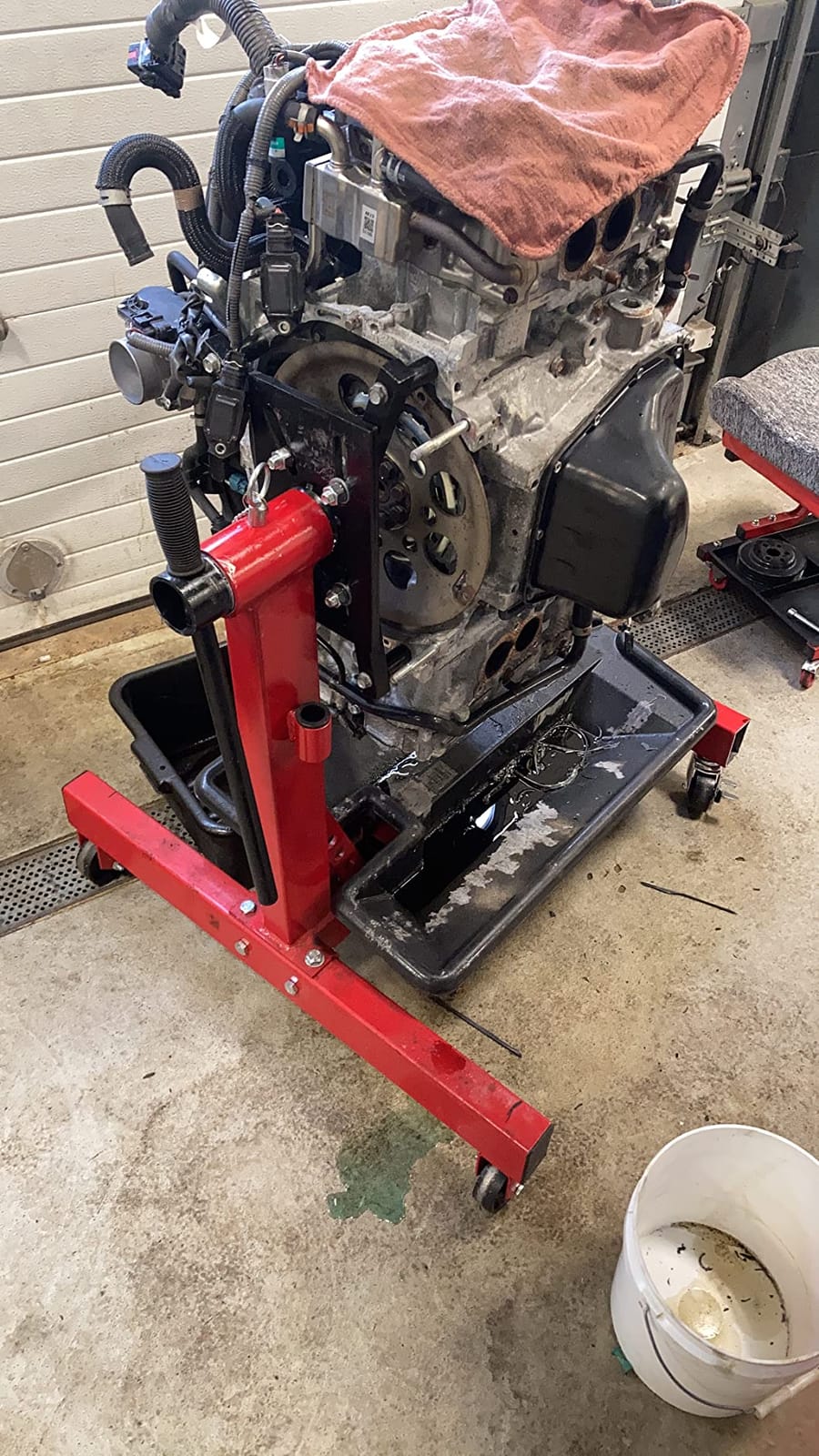BIG RED Steel Rotating Engine Motor Stand, 3/4 Ton (1,500 lbs) Capacity with Foldable Frame, 5 Casters, 4 Adjustable Arms, 360 Degree Rotating Head, for Vehicle Maintenance, Auto Repair, Red, AT37912-1 customer photo 1
