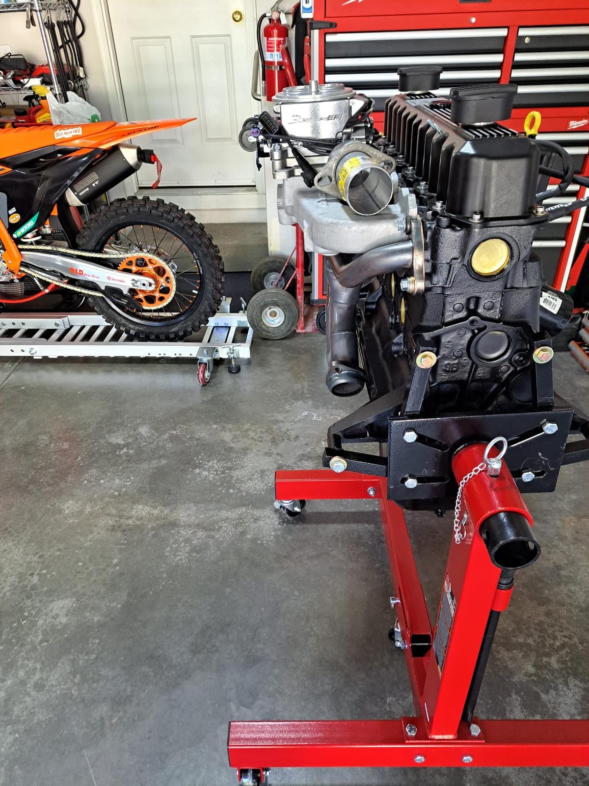 BIG RED Steel Rotating Engine Motor Stand, 3/4 Ton (1,500 lbs) Capacity with Foldable Frame, 5 Casters, 4 Adjustable Arms, 360 Degree Rotating Head, for Vehicle Maintenance, Auto Repair, Red, AT37912-1 customer photo 2