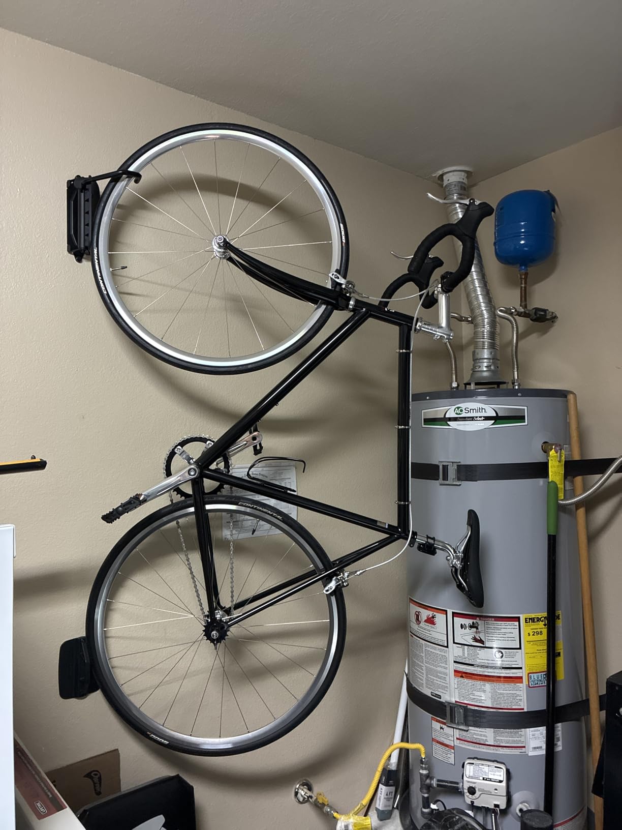 monTEK Swivel Bike Wall Mount, Bike Hangers for Garage, 4 Pack | Heavy-duty vertical bike storage rack swivels 150° to save space; holds 66 lb each and fits tires up to 3.54 in wide customer photo 1