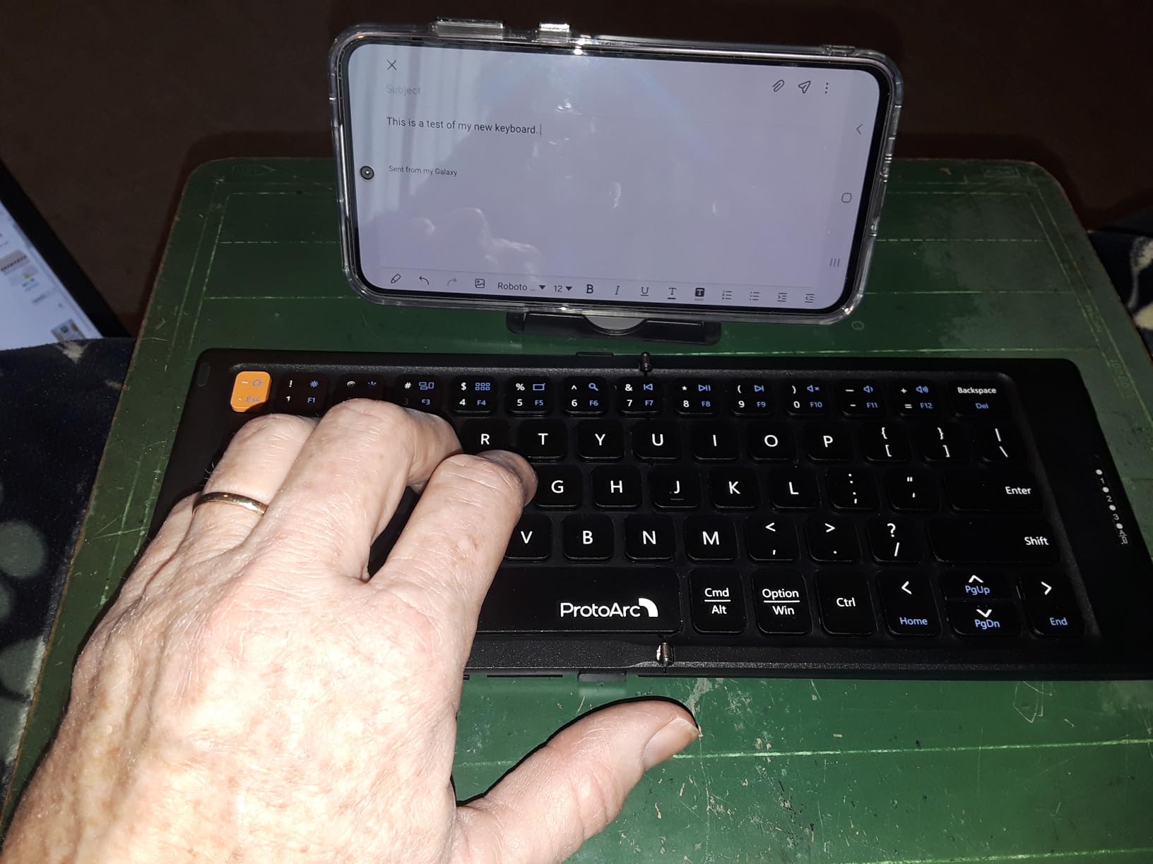 ProtoArc XK04 Foldable Compact Keyboard for Phone and Tablet, Black | Pocket-Sized, PU Leather Cover, Bluetooth 3-Device Workflow, for Business Travelers, On-the-go Typing customer photo 1