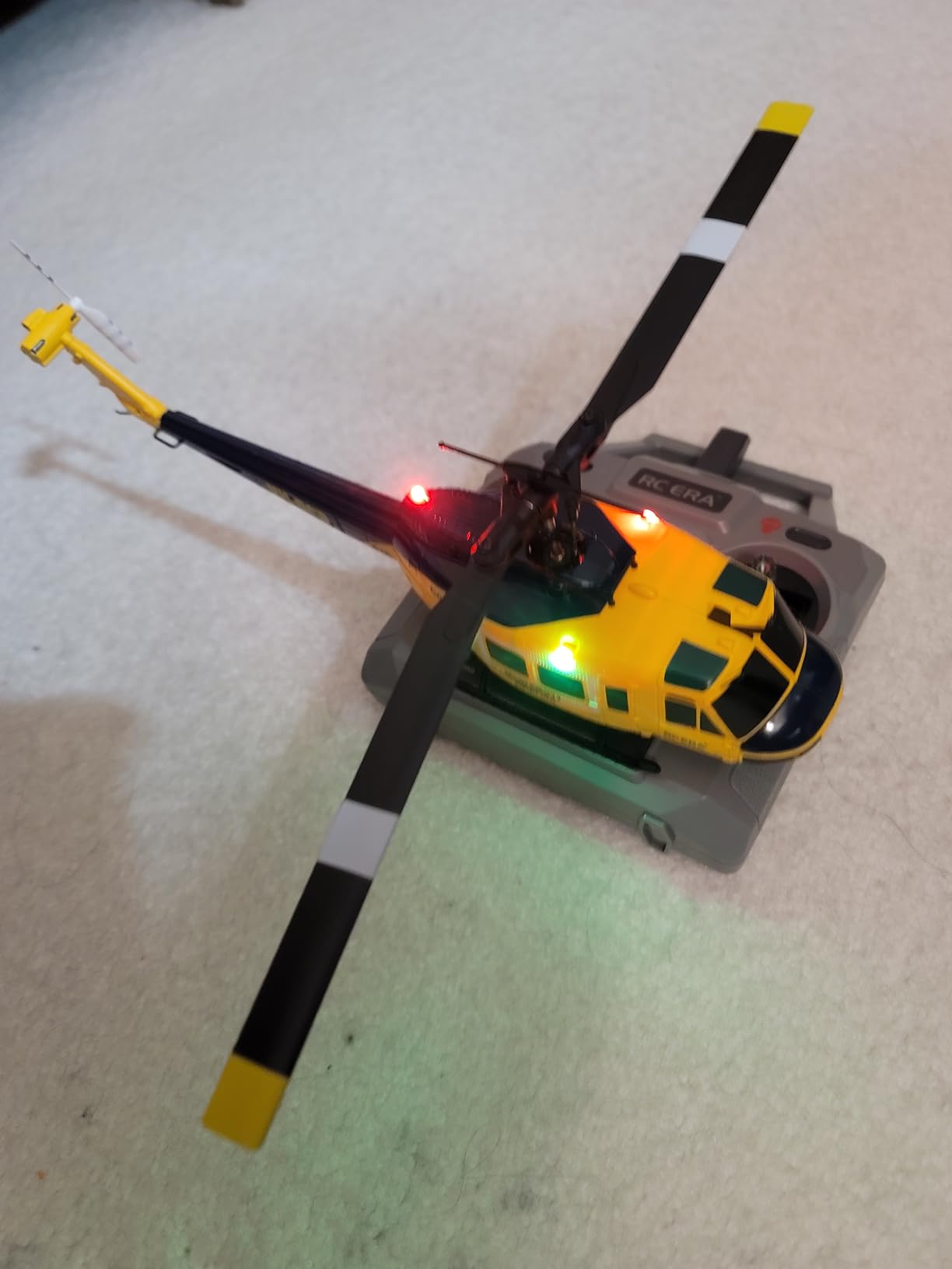 RC ERA C032 UH-1 Huey Helicopter - Remote Control Helicopters for Adult, 1/48 Sacle 2.4G 6CH Gyro Stabilized Aircraft with Altitude Hold & Optical Flow,3D Stunt Drone (Green) customer photo 2