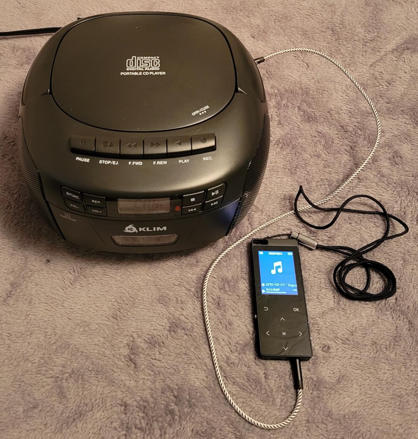 KLIM CD Player & Cassette Tape Player with Case, Bluetooth Boombox, AM/FM Radio, Stereo Sound, Remote, CD and Cassette Combo, Tape Recording, USB Drive, AUX, AC/DC Powered customer photo 1