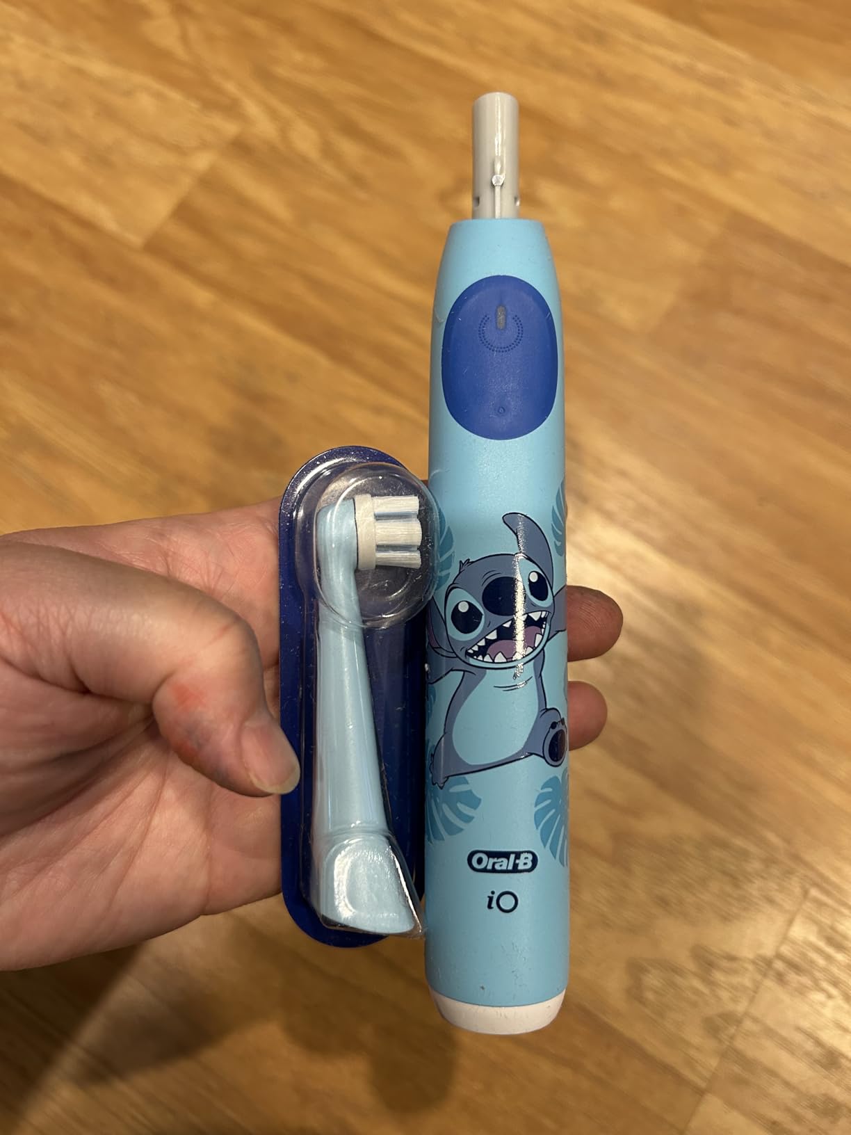 Oral-B iO Kids Rechargeable Electric Toothbrush, Stitch with 1 Brush Head - Automatic Pressure Sensor - 3 Cleaning Settings - 2 Min Music Timer - 28 Day Battery Life customer photo 1