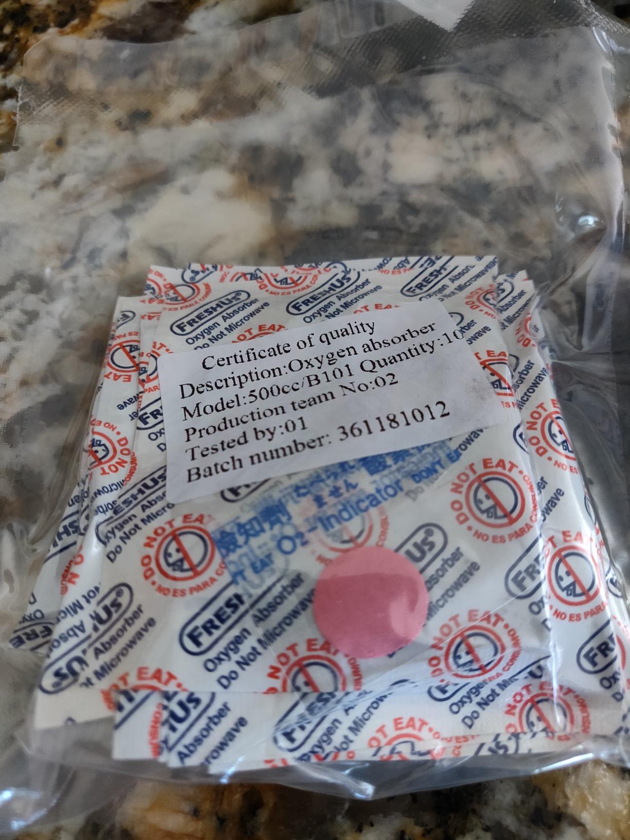 PackFreshUSA: 50 Pack (5 x 10 Packs) - 500cc Oxygen Absorber Packs - Food Grade - Non-Toxic - Food Preservation - Long-Term Food Storage Guide Included customer photo 1