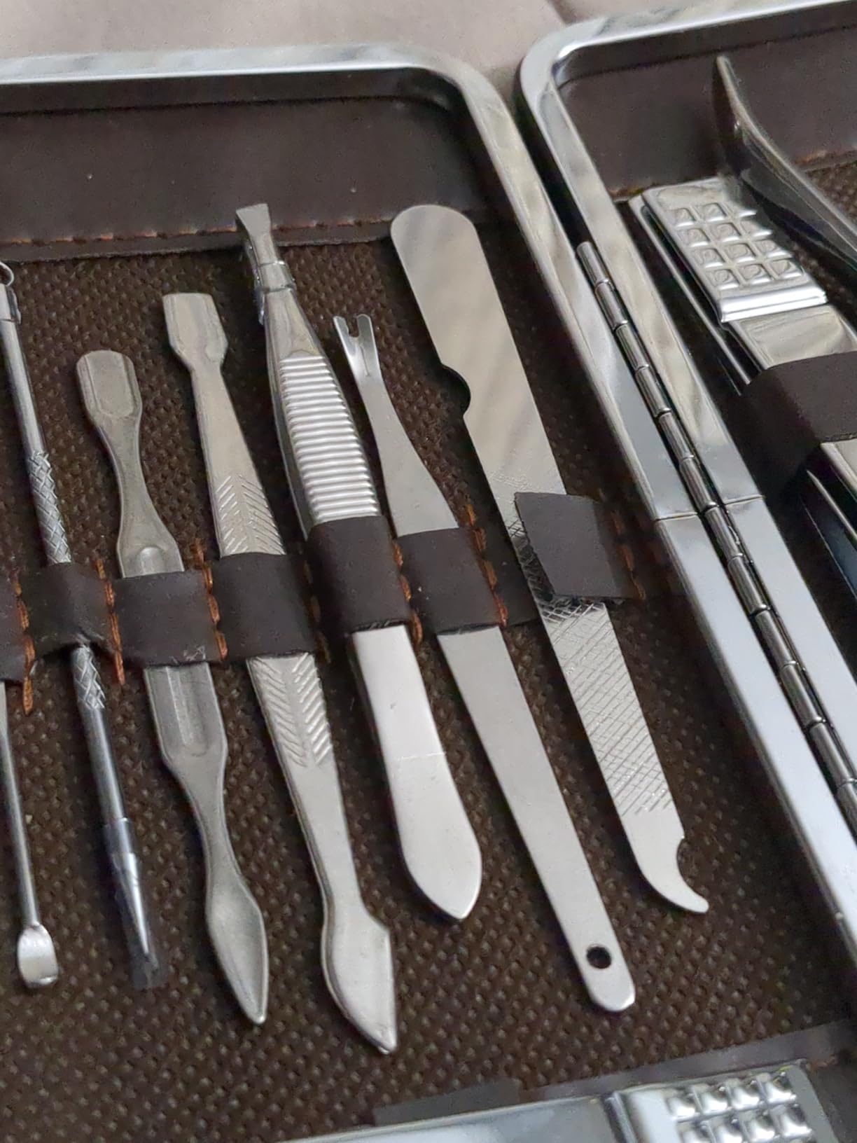 Professional Manicure and Pedicure Kit, 12-Piece Premium Grooming Set with Nail Clippers, Facial Care Tools, and Luxurious Travel Case for Men and Women customer photo 2