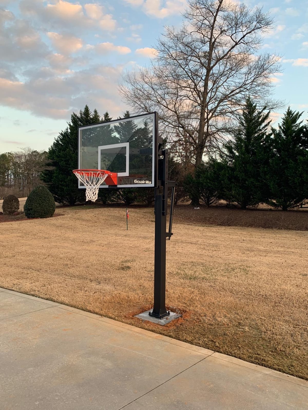Goalrilla Basketball Hoop with Tempered Glass Basketball Goal Backboard, Black Anodized Frame, and In-ground Anchor System customer photo 1
