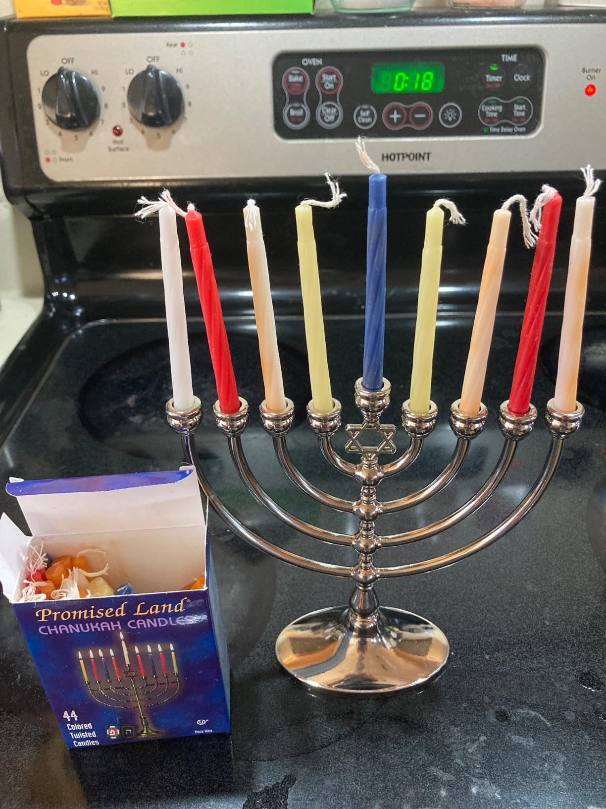 The Dreidel Company Hanukkah Menorah with Traditional Star Polished Aluminum Finish, Full Size 7 Inches Tall customer photo 1
