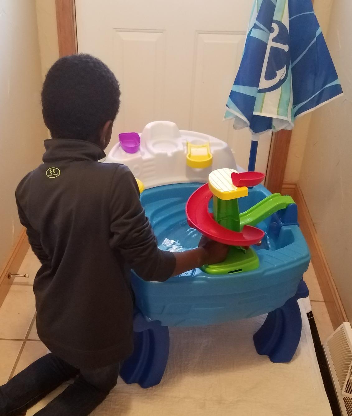 Step2 Fiesta Cruise Sand & Water Table with Umbrella, Kids Activity Sensory Playset, Summer Outdoor Toys, 10 Piece Water Toy Accessories, for Toddlers 2+ Years Old customer photo 1