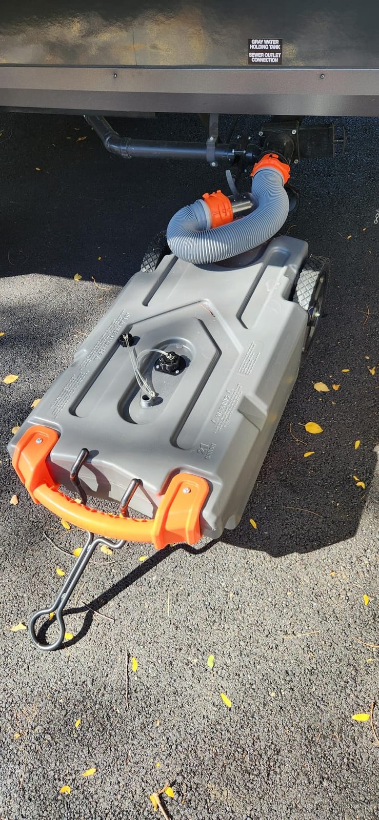 Camco Rhino 28-Gallon Camper/RV Tote Tank - Features Large Heavy-Duty No-Flat Wheels & Built-in Gate Valve - Removable Steel Tow Adapter, 3’ Sewer Hose & More RV Accessories (39004) customer photo 1