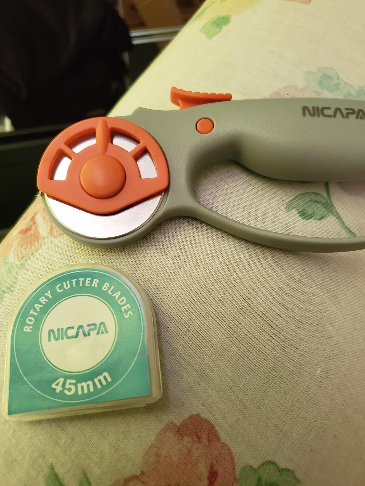 NICAPA 45mm Rotary Cutter for Fabric with Safety Lock Ergonomic Classic Comfort Loop Rotary Cutter for Crafting Sewing Quilting (Extra 5pcs 45mm Replacement Blades Included) customer photo 1