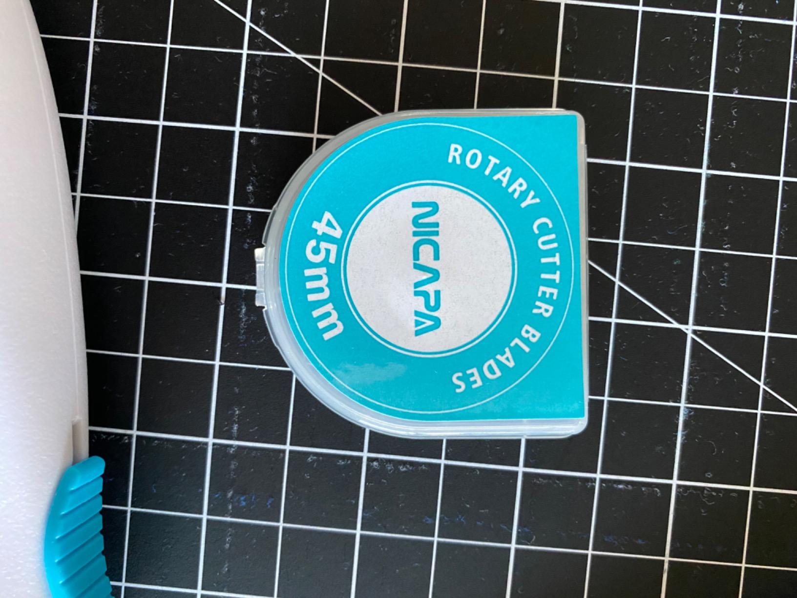 NICAPA 45mm Rotary Cutter for Fabric with Safety Lock Ergonomic Classic Comfort Loop Rotary Cutter for Crafting Sewing Quilting (Extra 5pcs 45mm Replacement Blades Included) customer photo 2