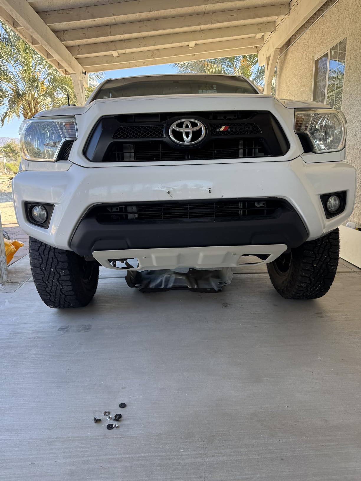 ECOTRIC Front Skid Plate Compatible with 2005-2015 Toyota Tacoma 2.7L 4.0L Engine Splash Shield Under Tray Skid Plate Replace for PT212-35075 customer photo 1